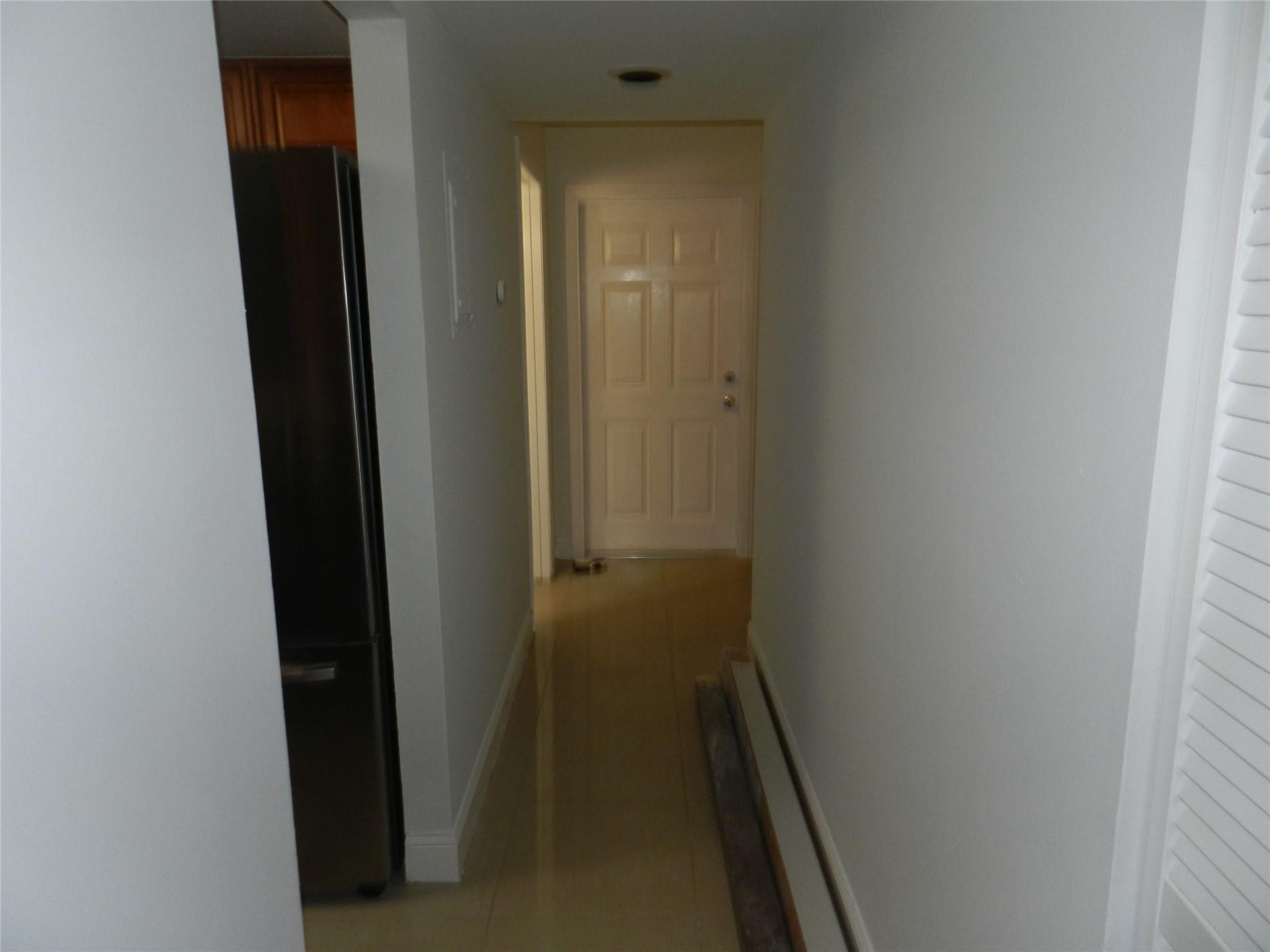 Hallway going to Front Door from Living Room