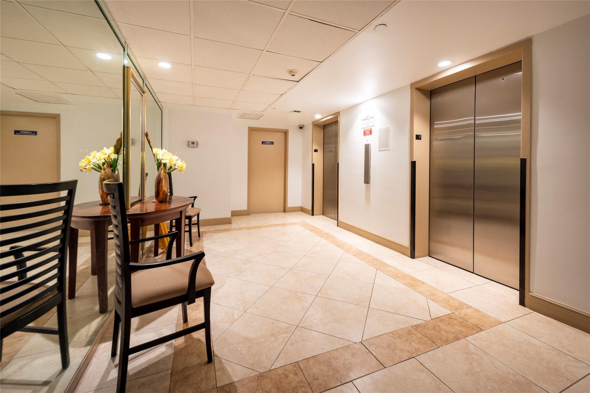 From Unit Door - Elevators - Laundry Room