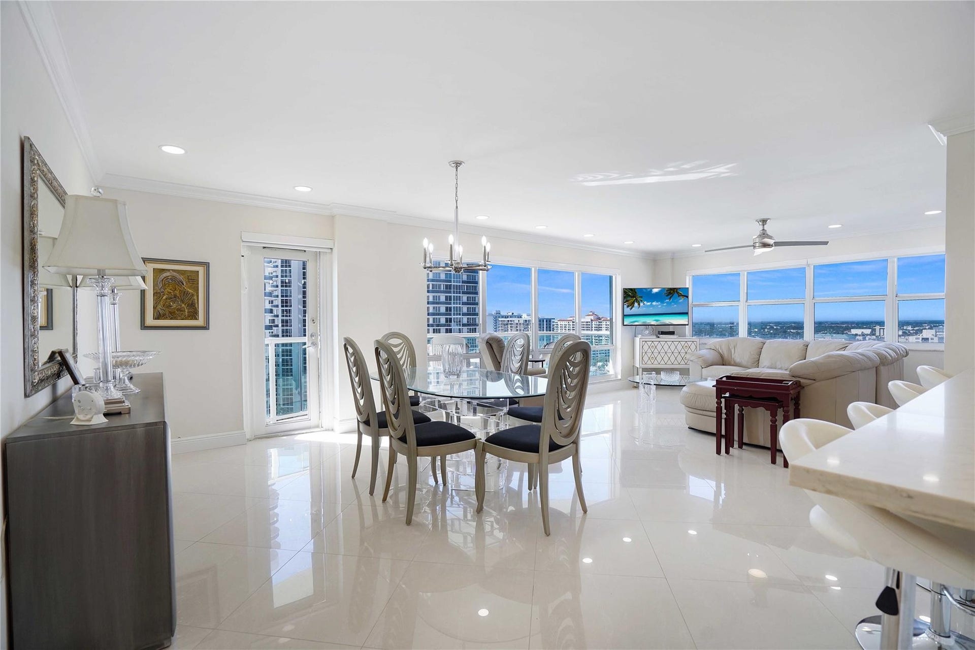 One of the best features of corner apartments is all of the windows and light. The door leads out to the sunny balcony.
