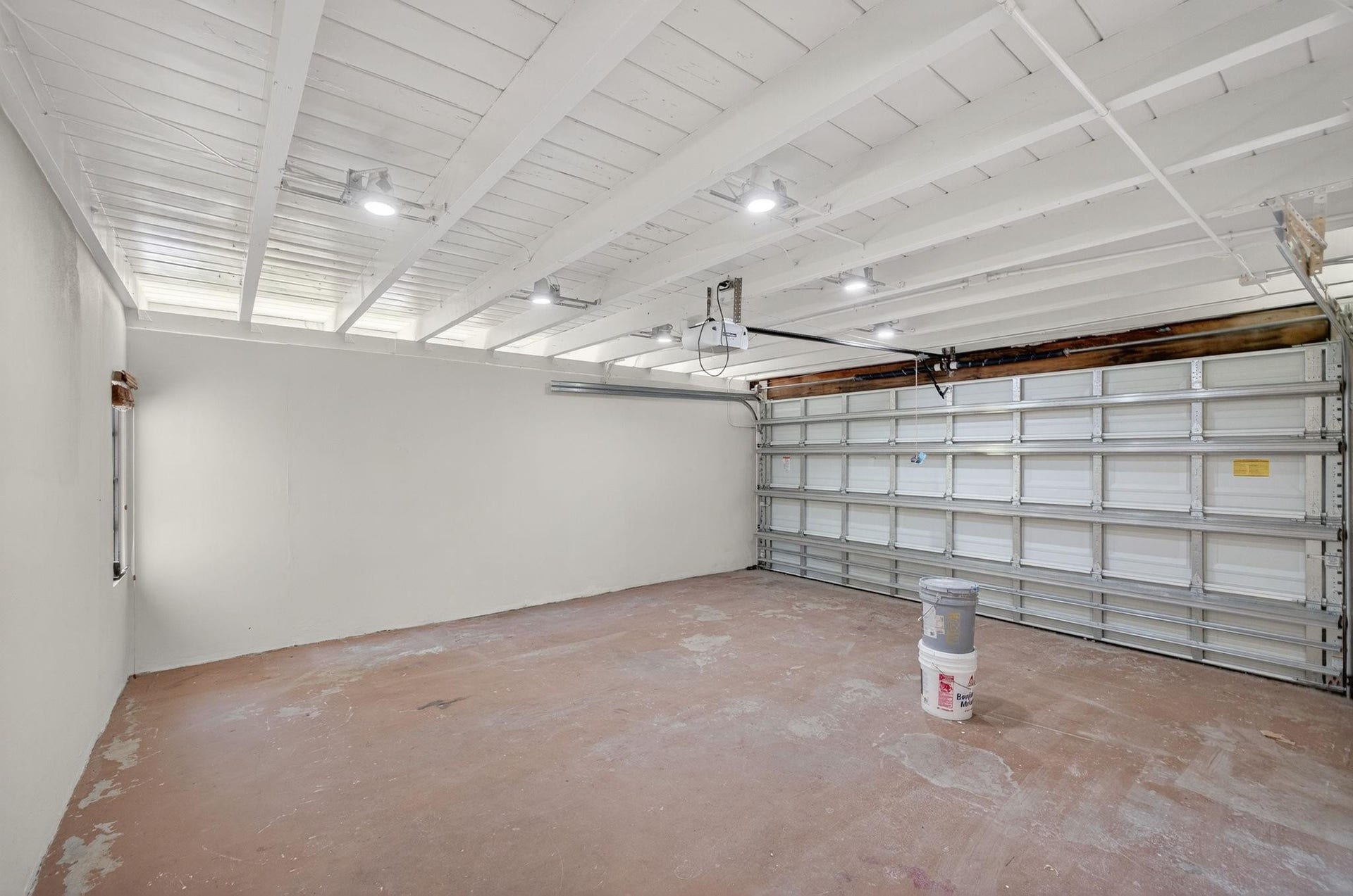 2 Car Garage features brand new door and opener.