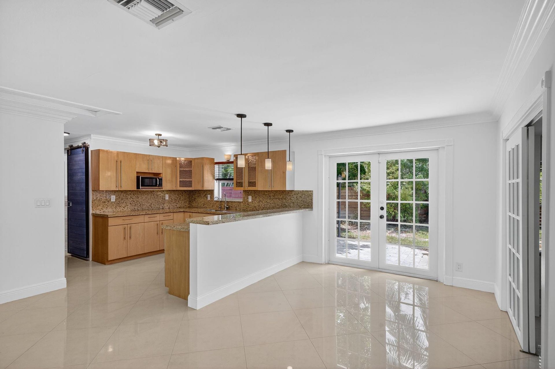 The Kitchen features an open concept that seamlessly connects the living, dining, and kitchen areasideal for everyday living and entertaining.