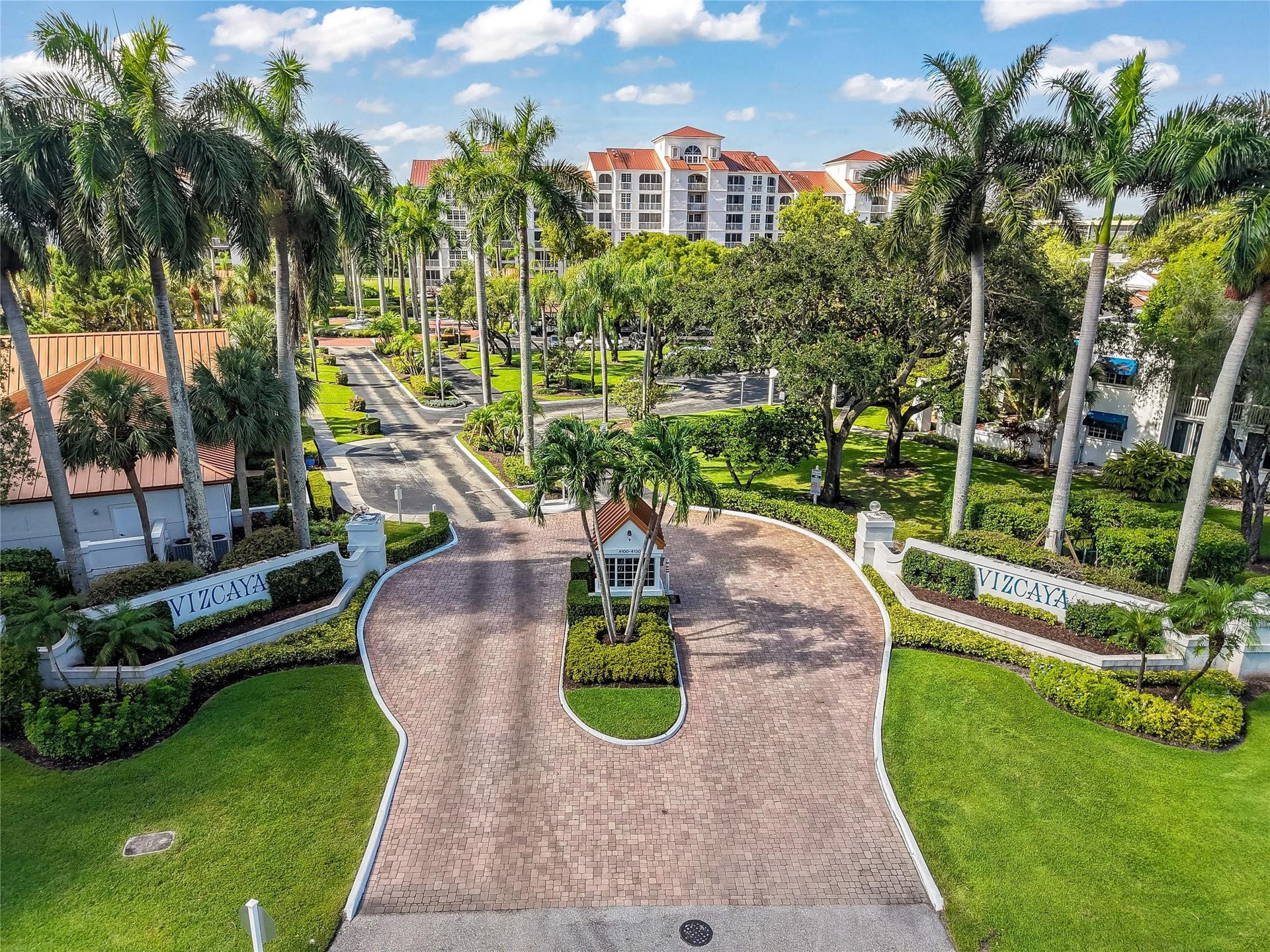4116 W Palm Aire Drive, #166b, Pompano Beach, FL 33069 Welcome to Vizcaya, a gated community with manicured grounds, towering palms, and a stately brick paver drive entrance.