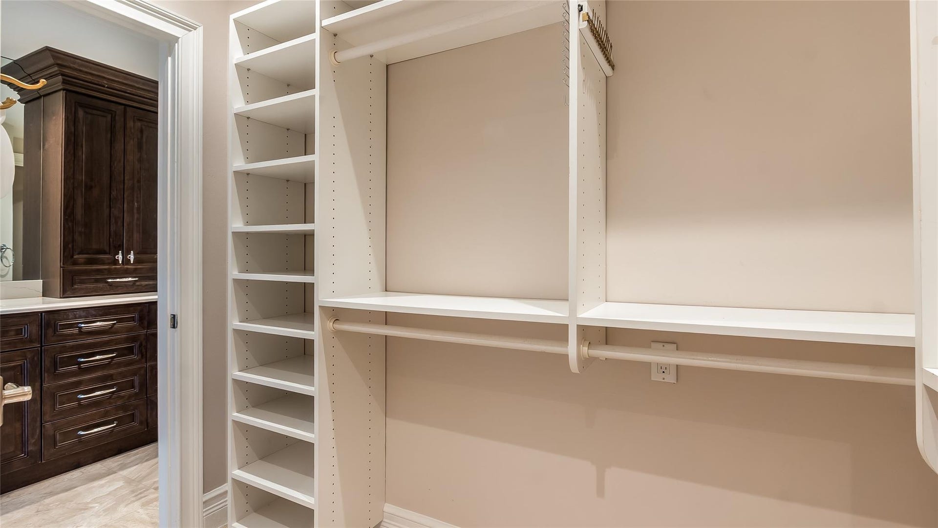 4116 W Palm Aire Drive, #166b, Pompano Beach, FL 33069 Primary Bed: Well-designed walk-in closet conveniently connects to the bathroom, creating a seamless dressing area.