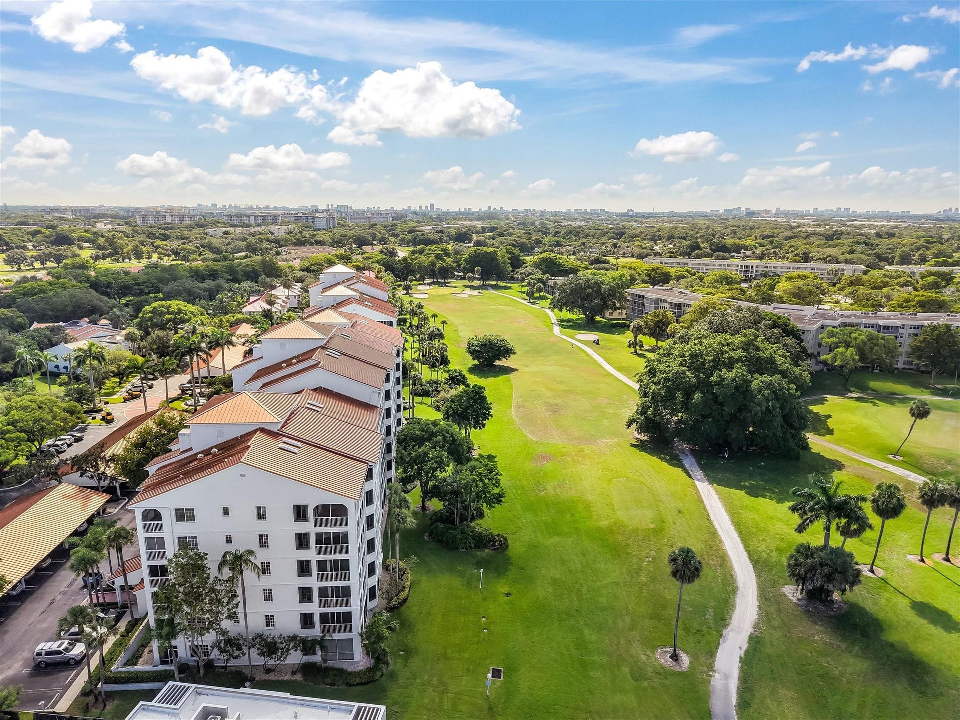 4116 W Palm Aire Drive, #166b, Pompano Beach, FL 33069 Additional views of the fairway and sand traps highlight the idyllic setting right outside your door.