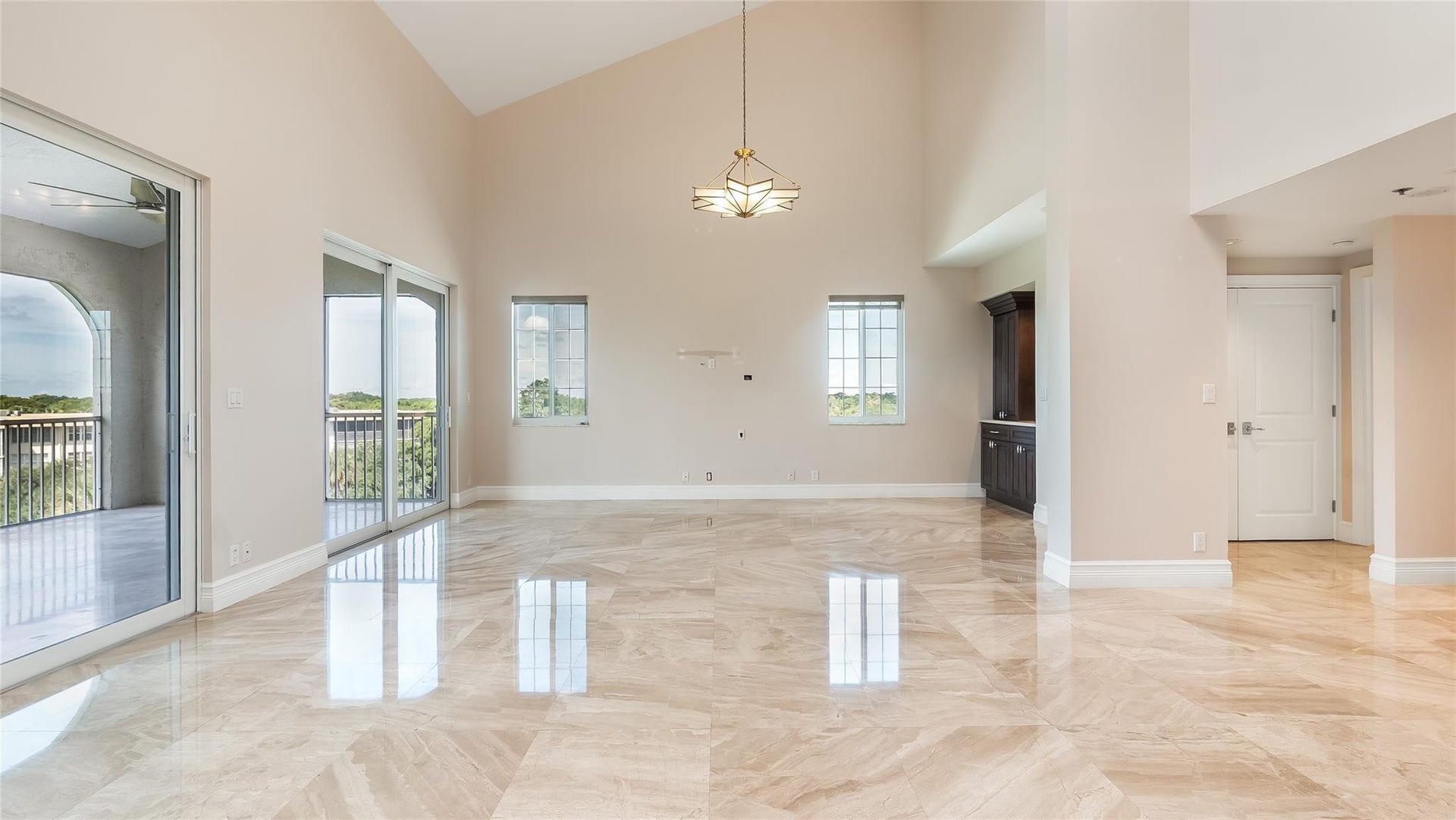 4116 W Palm Aire Drive, #166b, Pompano Beach, FL 33069 Multiple windows and clean sightlines create a bright, inviting space with flexible layout potential.