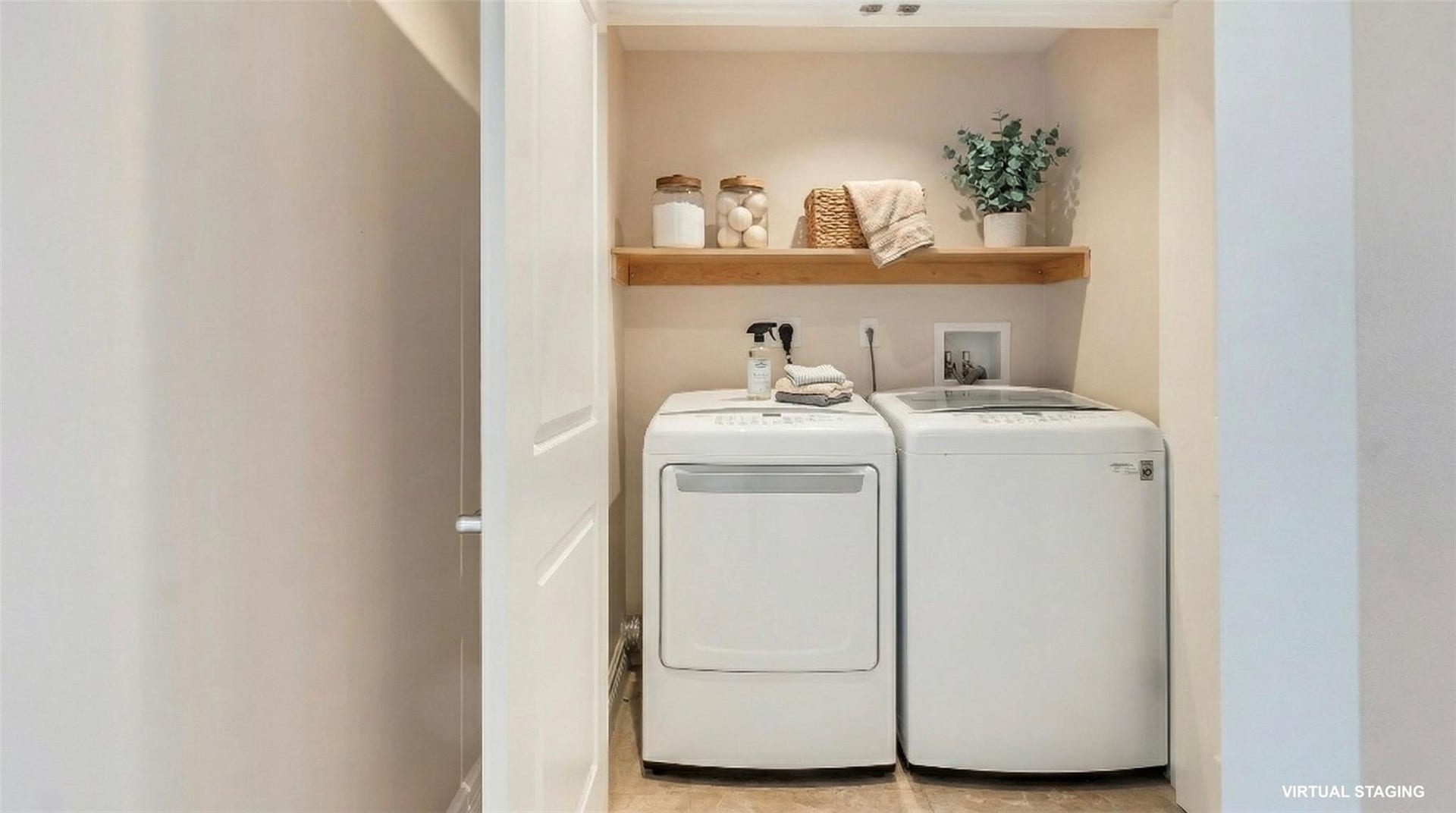 4116 W Palm Aire Drive, #166b, Pompano Beach, FL 33069 Convenient in-unit laundry with full-size LG washer and dryer, built-in shelf, and folding doors for a clean, tucked-away appearance.