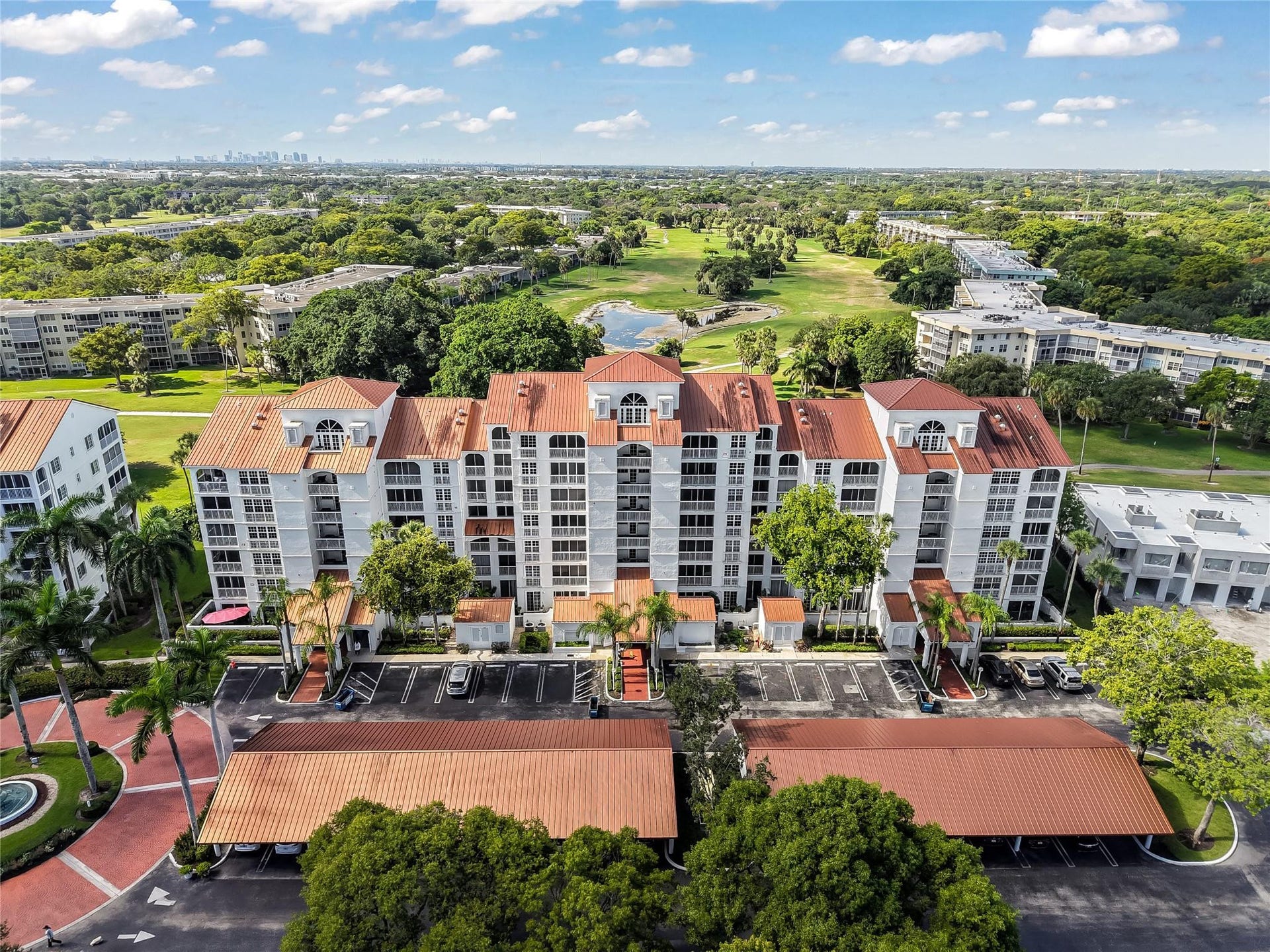 4116 W Palm Aire Drive, #166b, Pompano Beach, FL 33069 Far-reaching views toward the city skyline from the golf course provide a unique blend of nature and urban access.