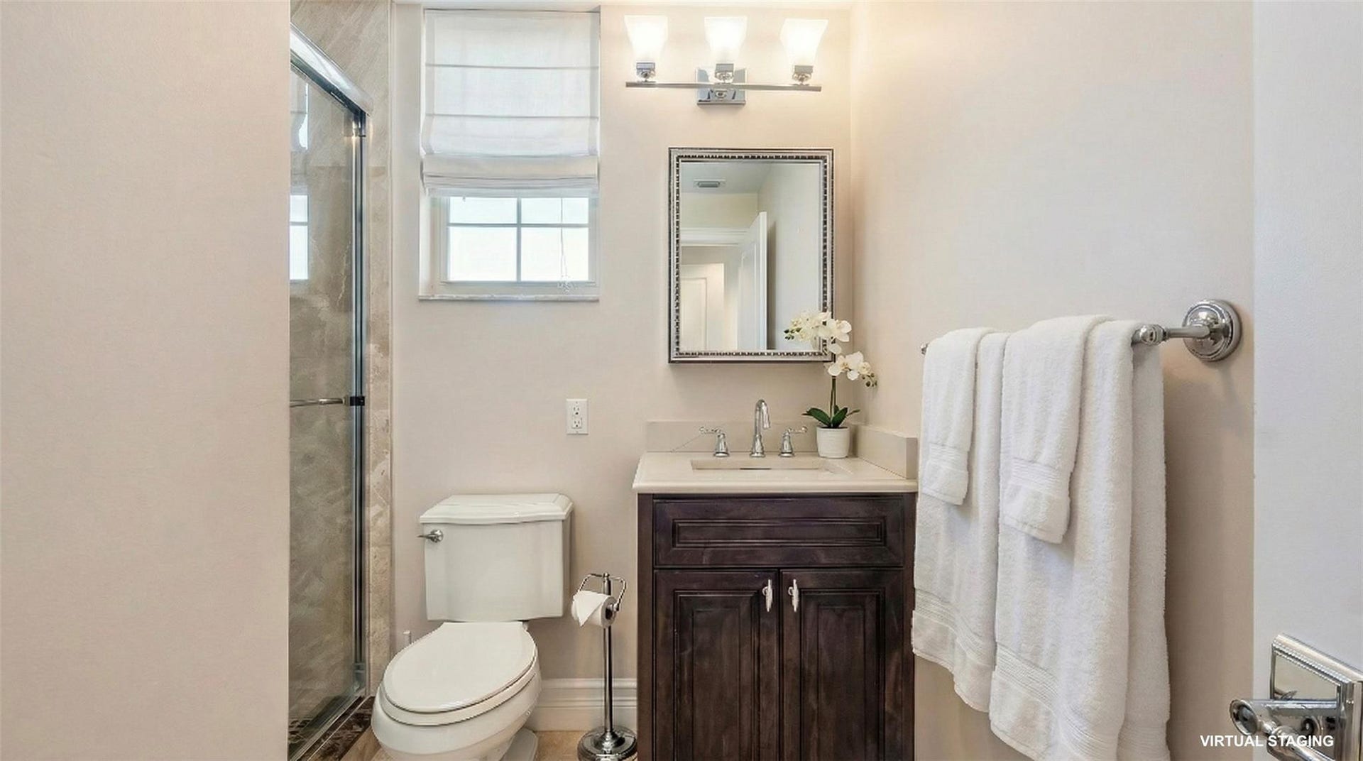 4116 W Palm Aire Drive, #166b, Pompano Beach, FL 33069 Bedroom 2 Bath: Updated guest bath with dark wood vanity, stone countertop, and modern lighting.