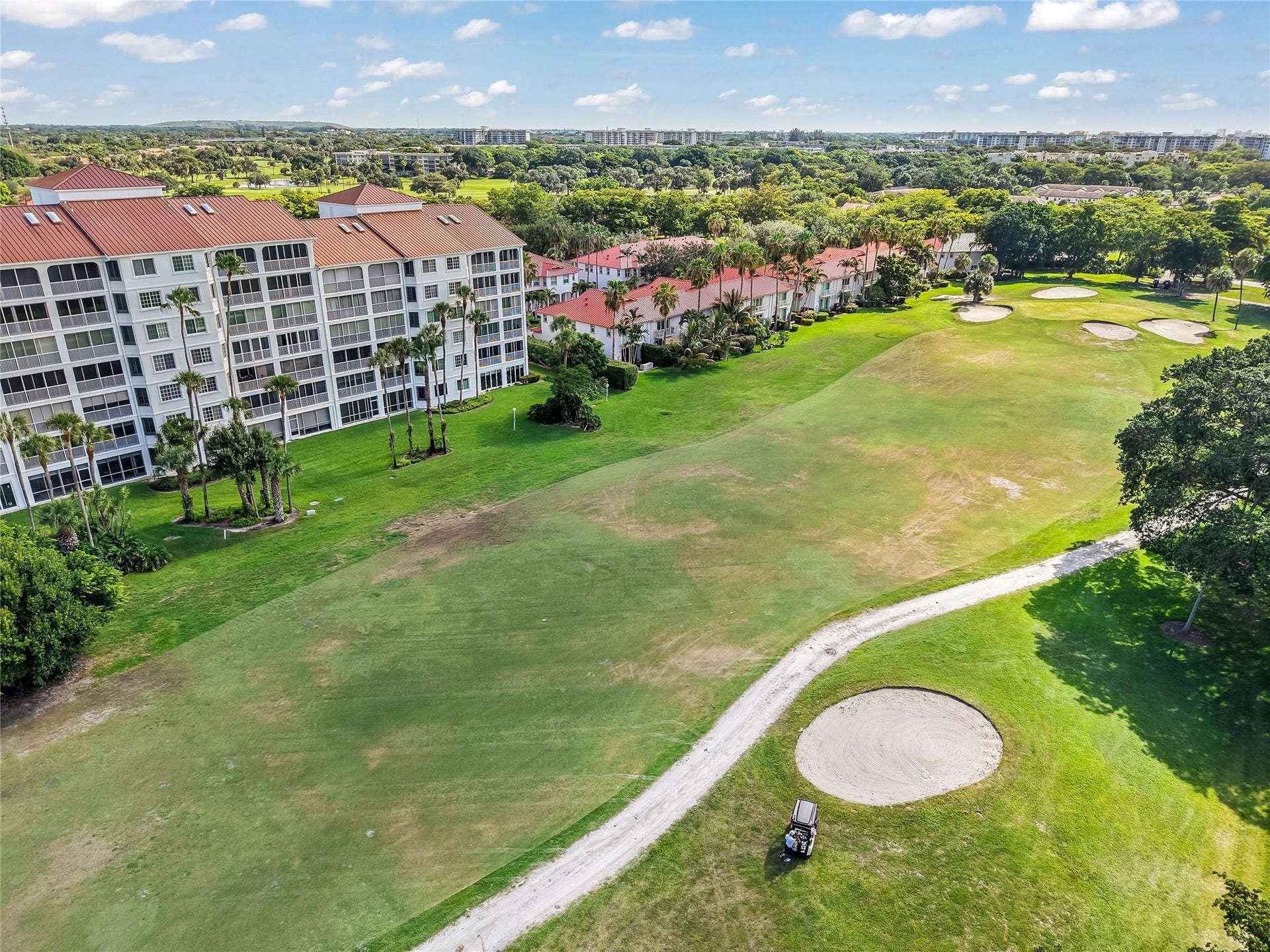 4116 W Palm Aire Drive, #166b, Pompano Beach, FL 33069 Additional views of the fairway and sand traps highlight the idyllic setting right outside your door.
