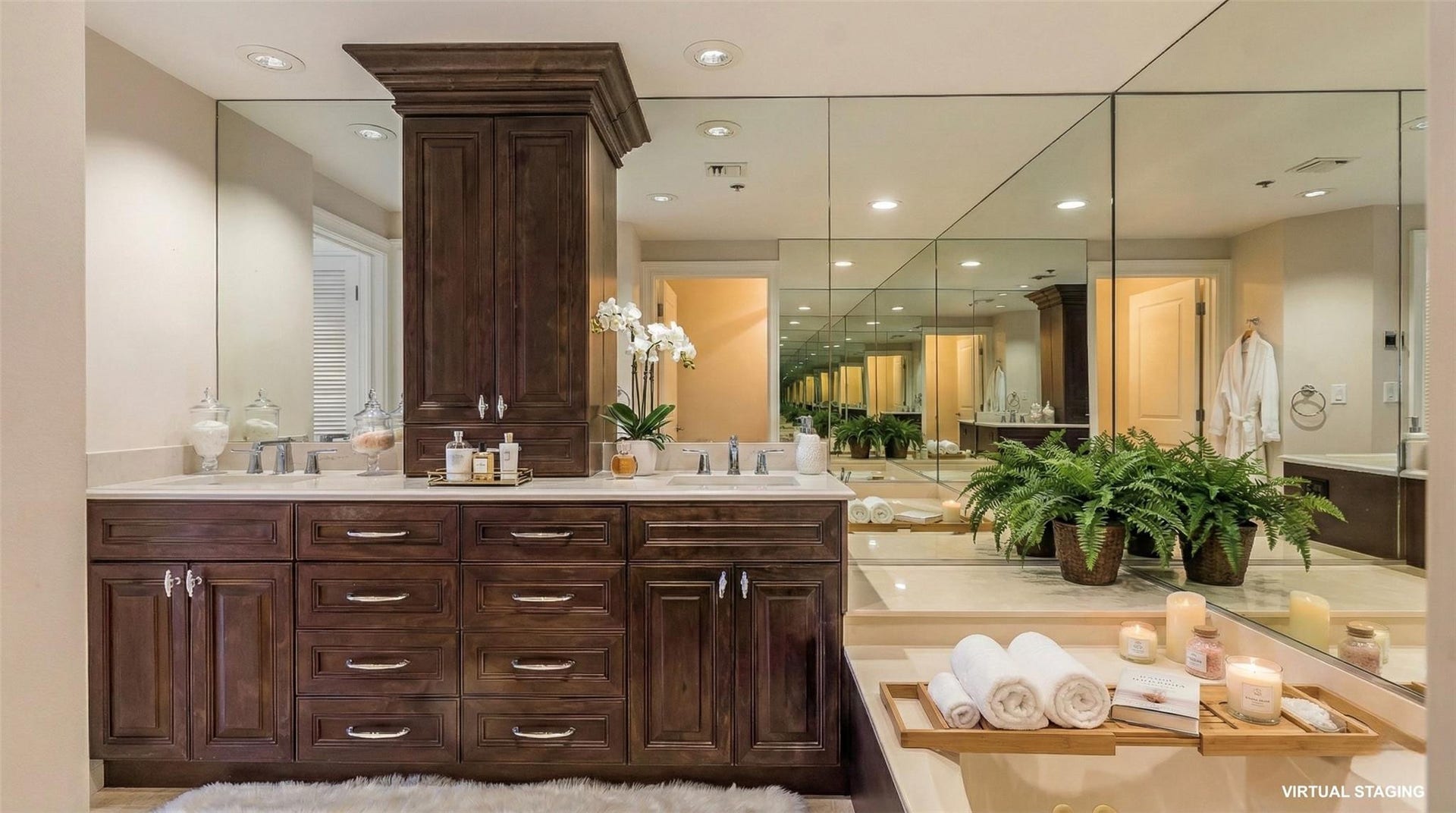 4116 W Palm Aire Drive, #166b, Pompano Beach, FL 33069 Soaking tub set beneath a mirrored wall adds a spa-like touch, with thoughtful storage and layout for everyday comfort.