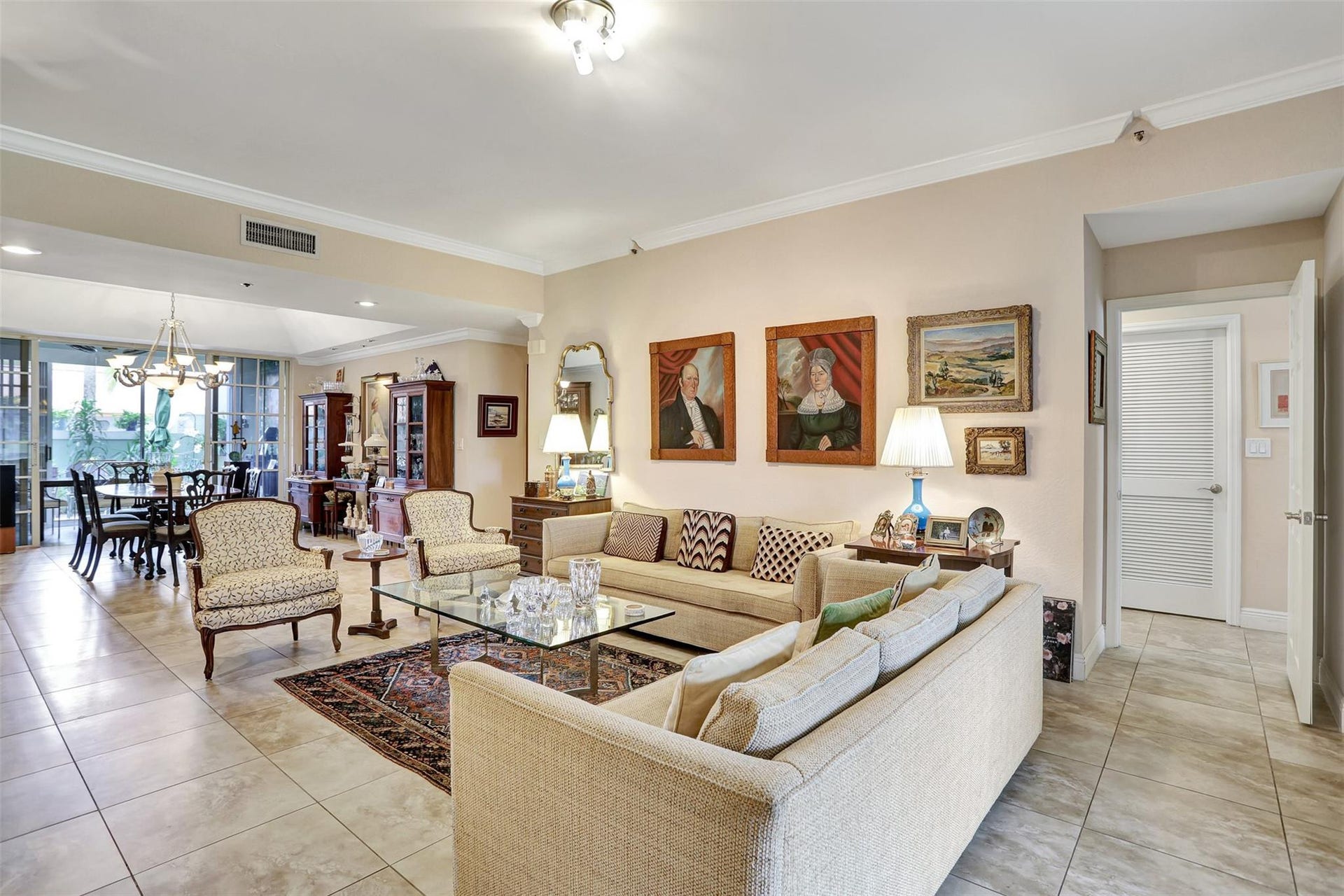 4112 W Palm Aire Drive, #121B, Pompano Beach, FL 33069 Living room with dining and breakfast room in back