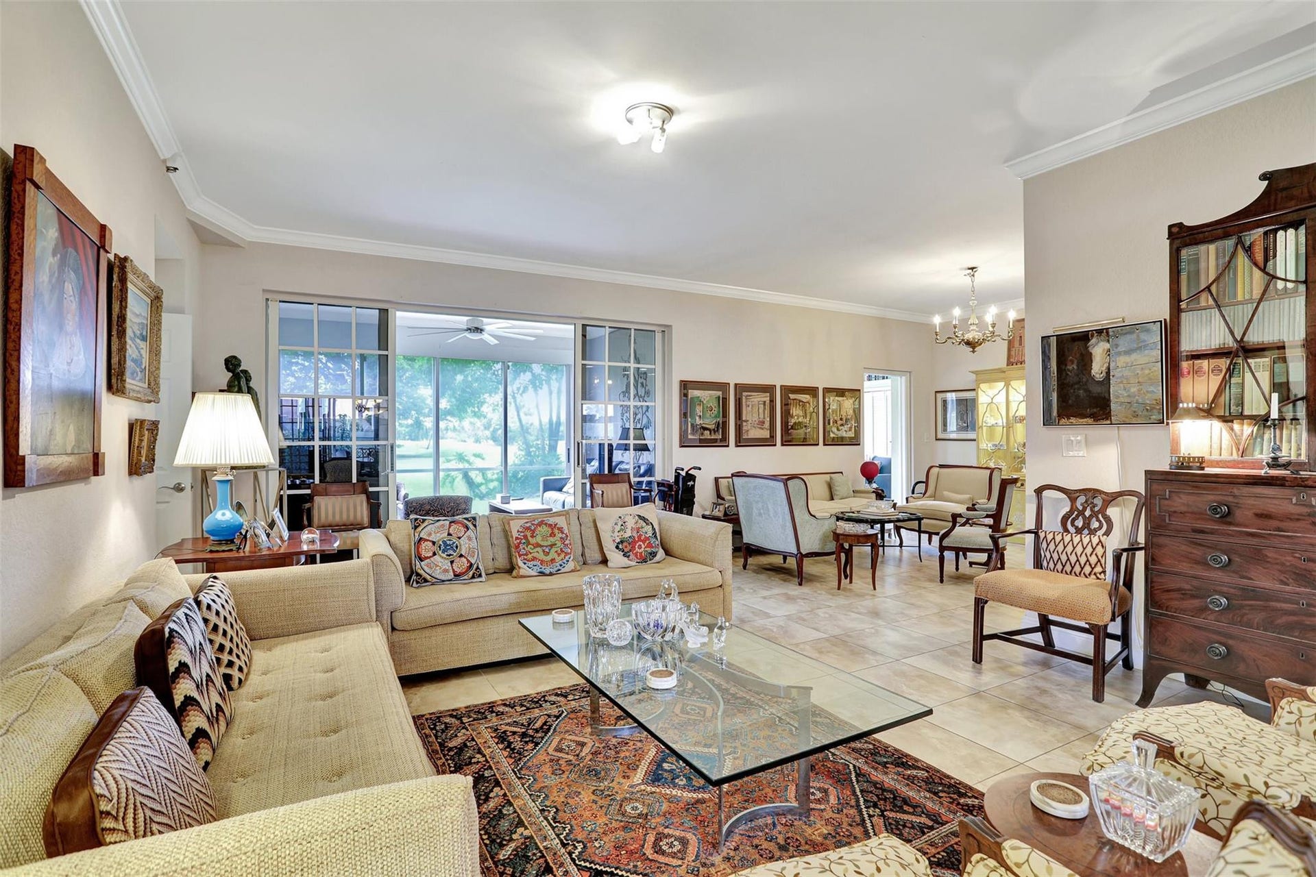 4112 W Palm Aire Drive, #121B, Pompano Beach, FL 33069 Living room with den on right and media room in back