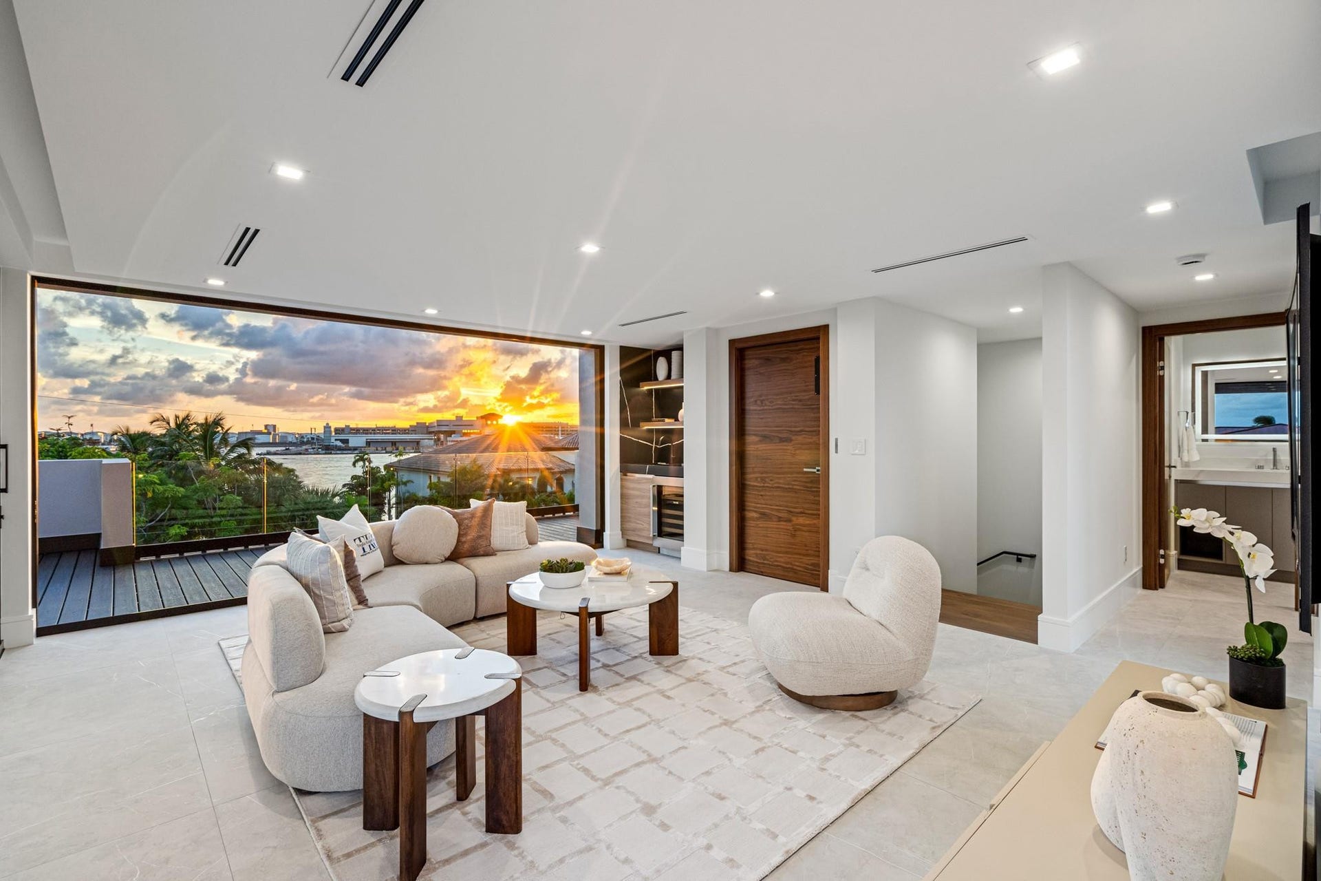 2000 Harbourview Drive, Fort Lauderdale, FL 33316 A spectacular third-floor sky lounge wrapped in floor-to-ceiling glass, capturing stunning sunset views over the water and city beyond. Elevated and dramatic, this sophisticated retreat is designed for unforgettable evenings and refined entertaining above it all.