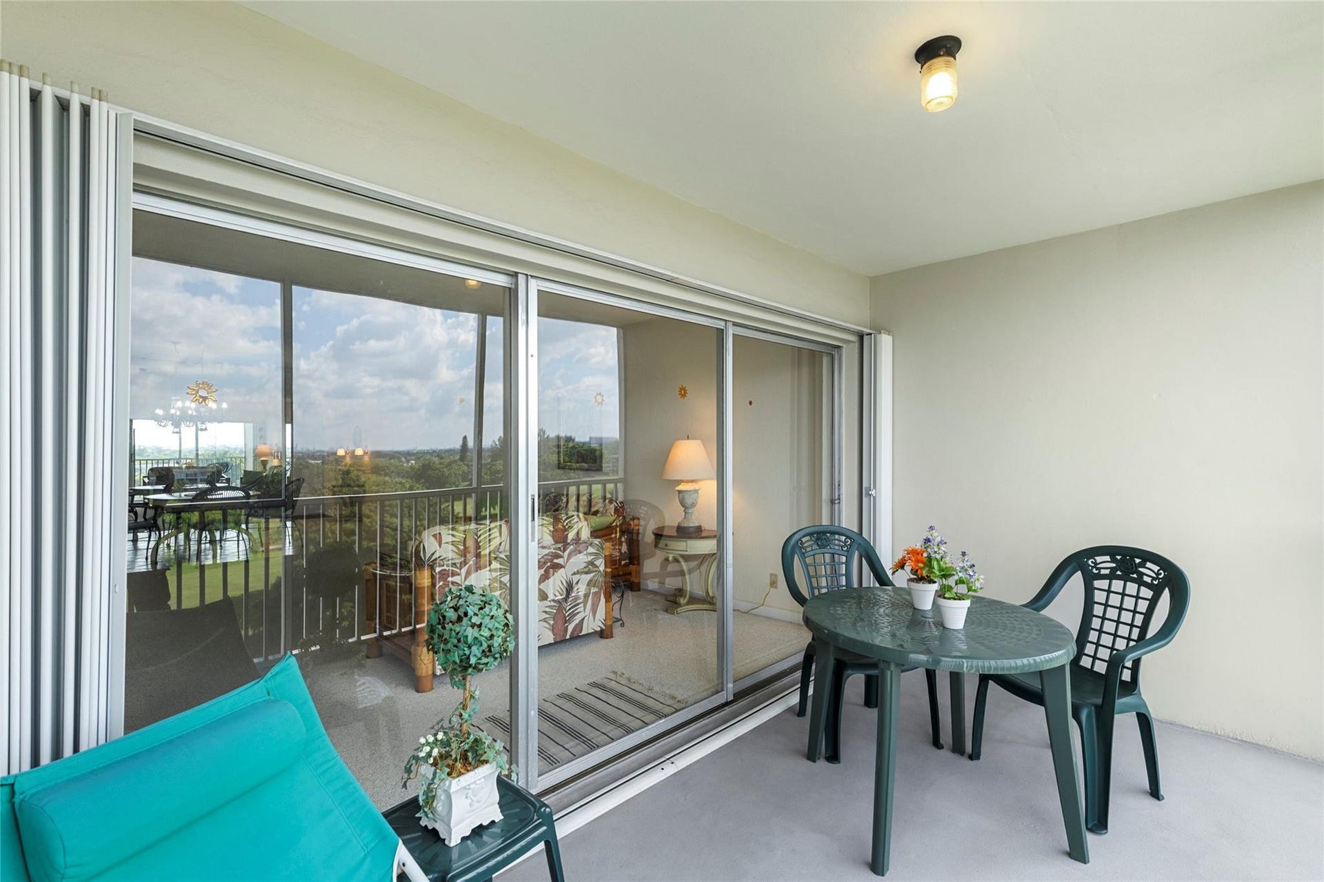 3100 N Palm Aire Drive, #803, Pompano Beach, FL 33069 Notice the accordion hurricane shutters that slide smoothly.