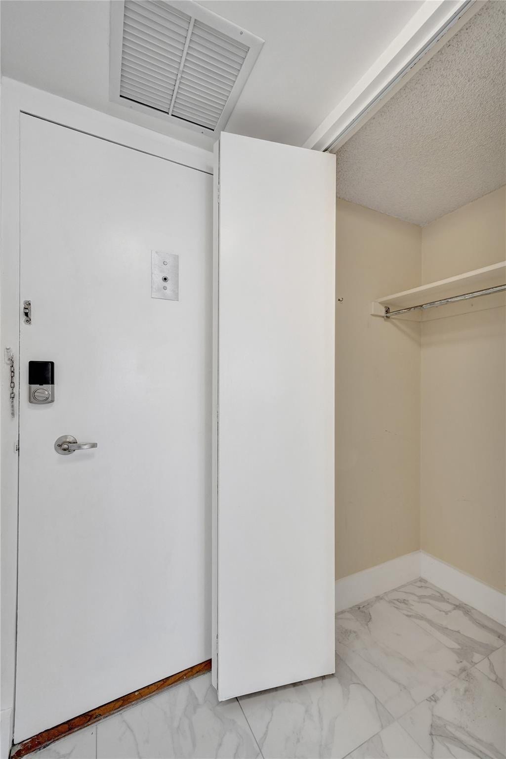 Closet to left of entry door.