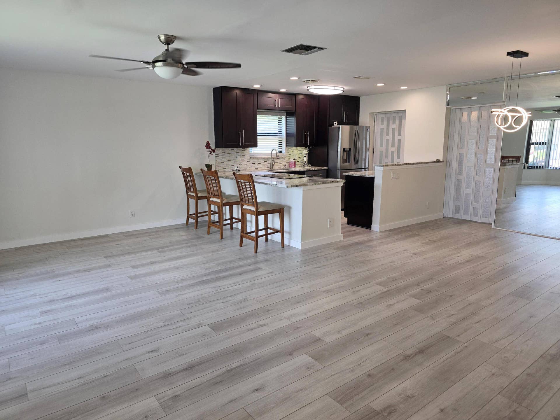 2098 SW 17th Drive, Deerfield Beach, FL 33442 View From Front Door with privacy doors closed
