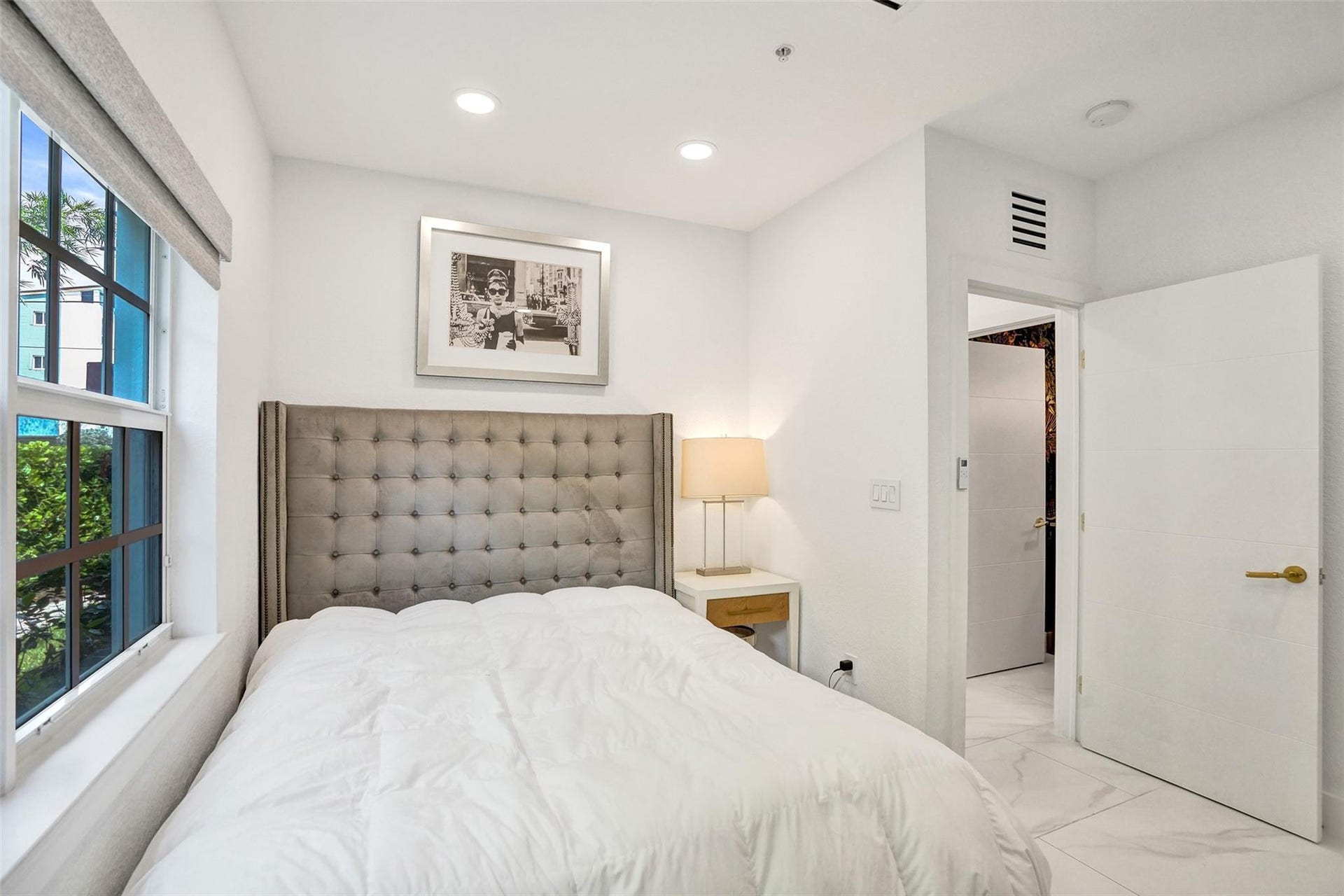 Downstairs den/bedroom with window views