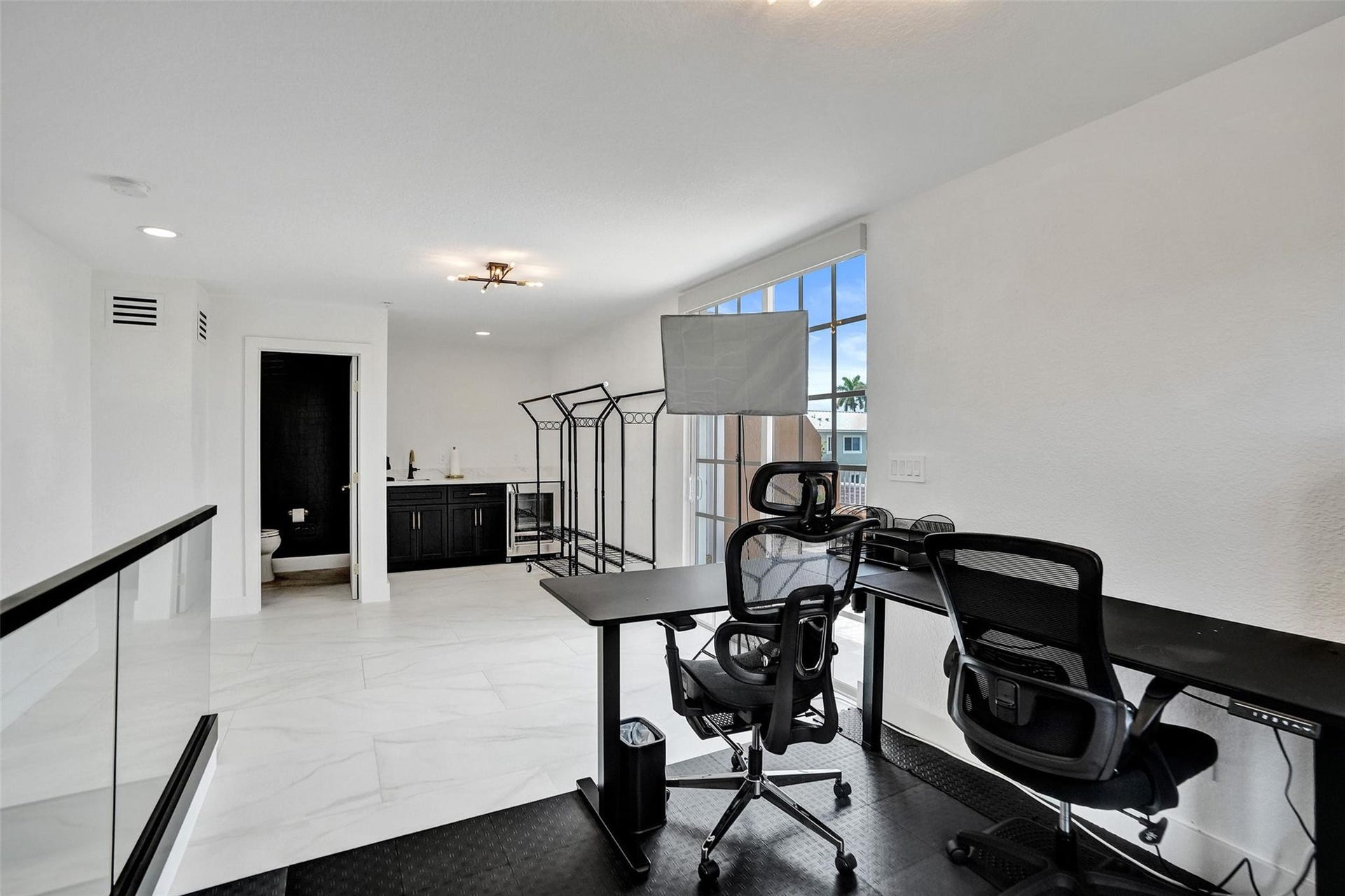 Loft/flex space leading to rooftop terrace.
