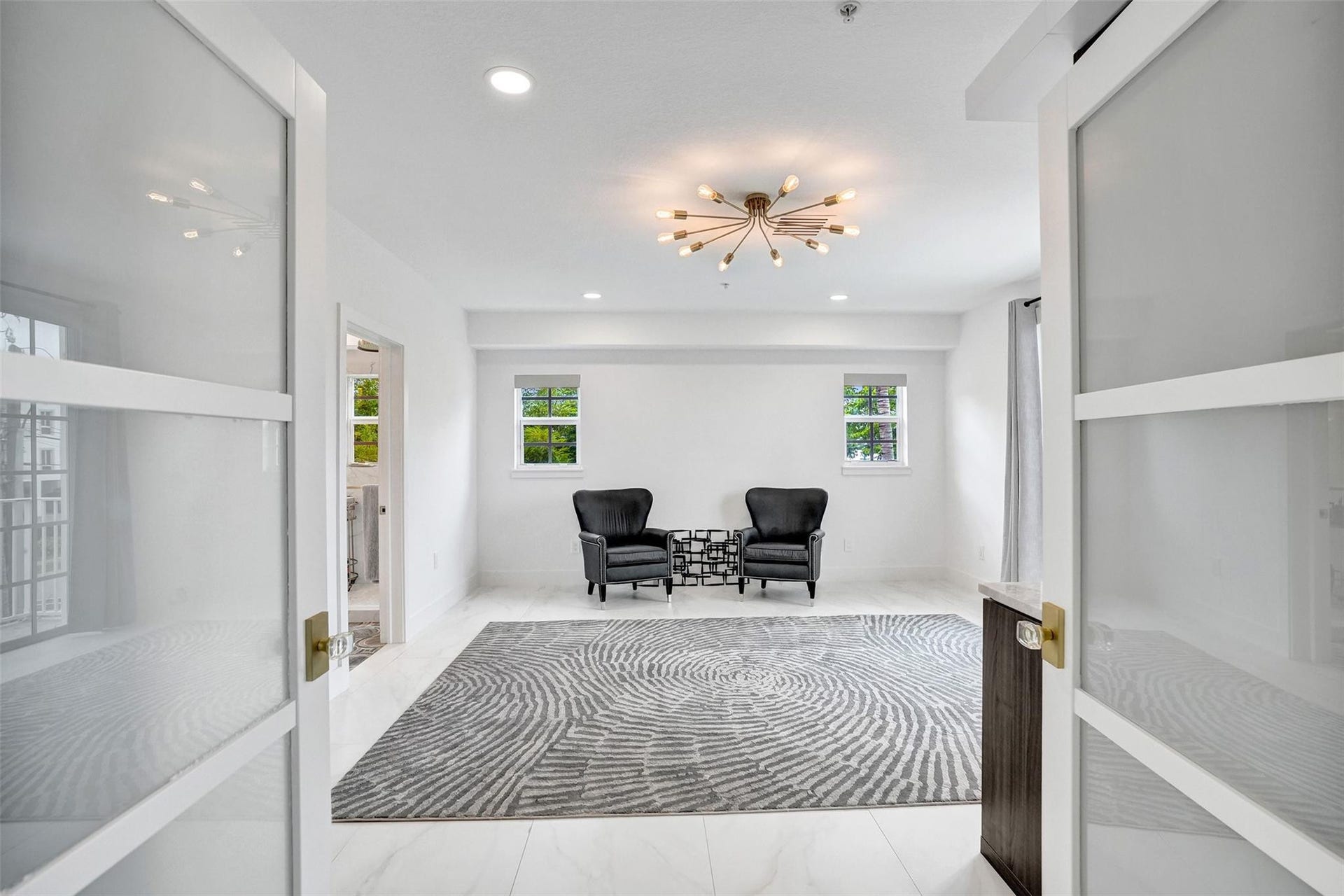 Primary suite with French door entrance.