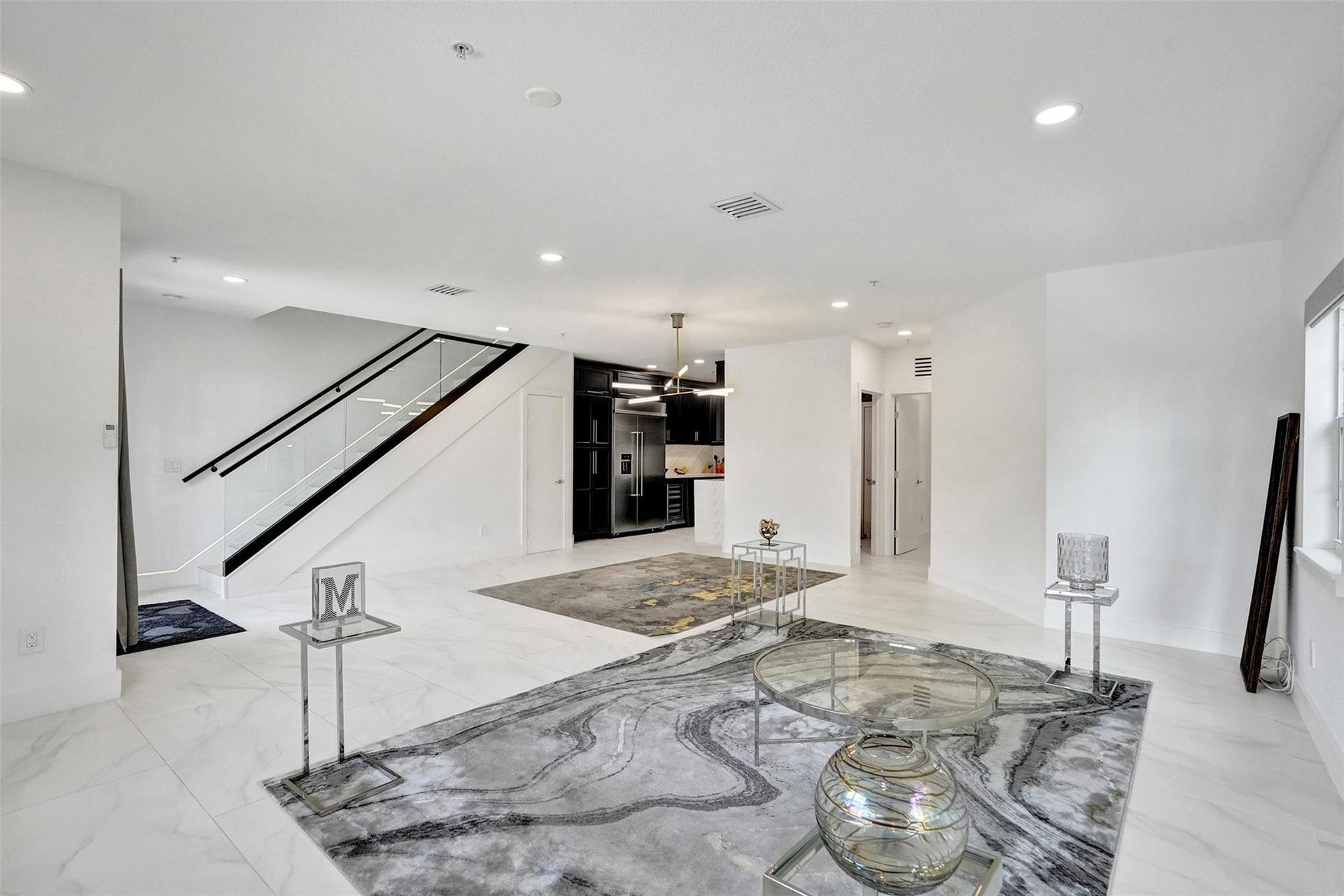 Spacious living area with designer finishes.