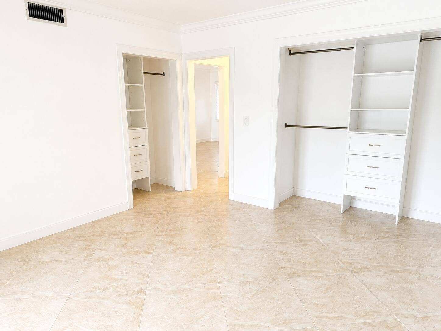 Tile floors and 2 closets with built ins