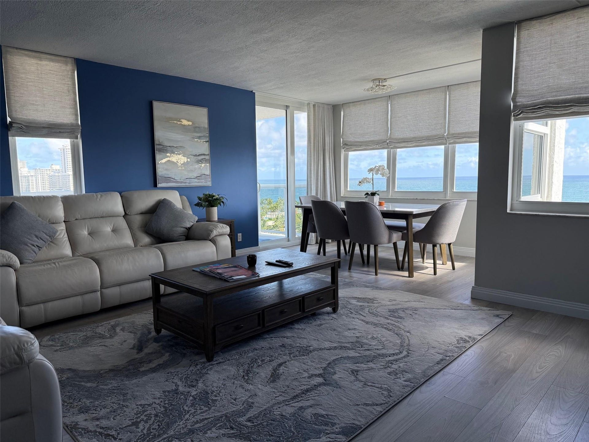 This photo shows the beautiful new window treatments installed on all windows in condo