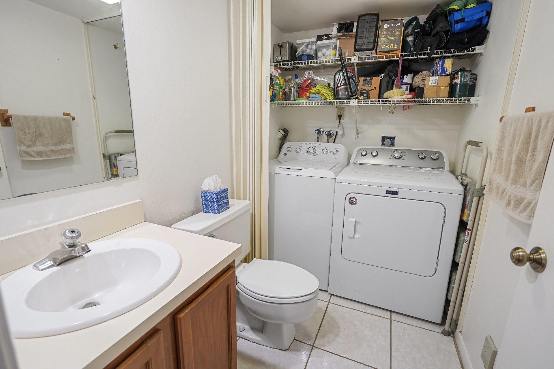 Half bath with washer and dryer