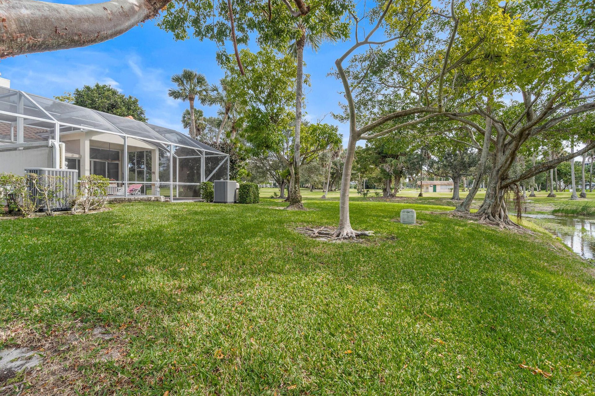 STREAM AND GOLF COURSE BEHIND HOUSE