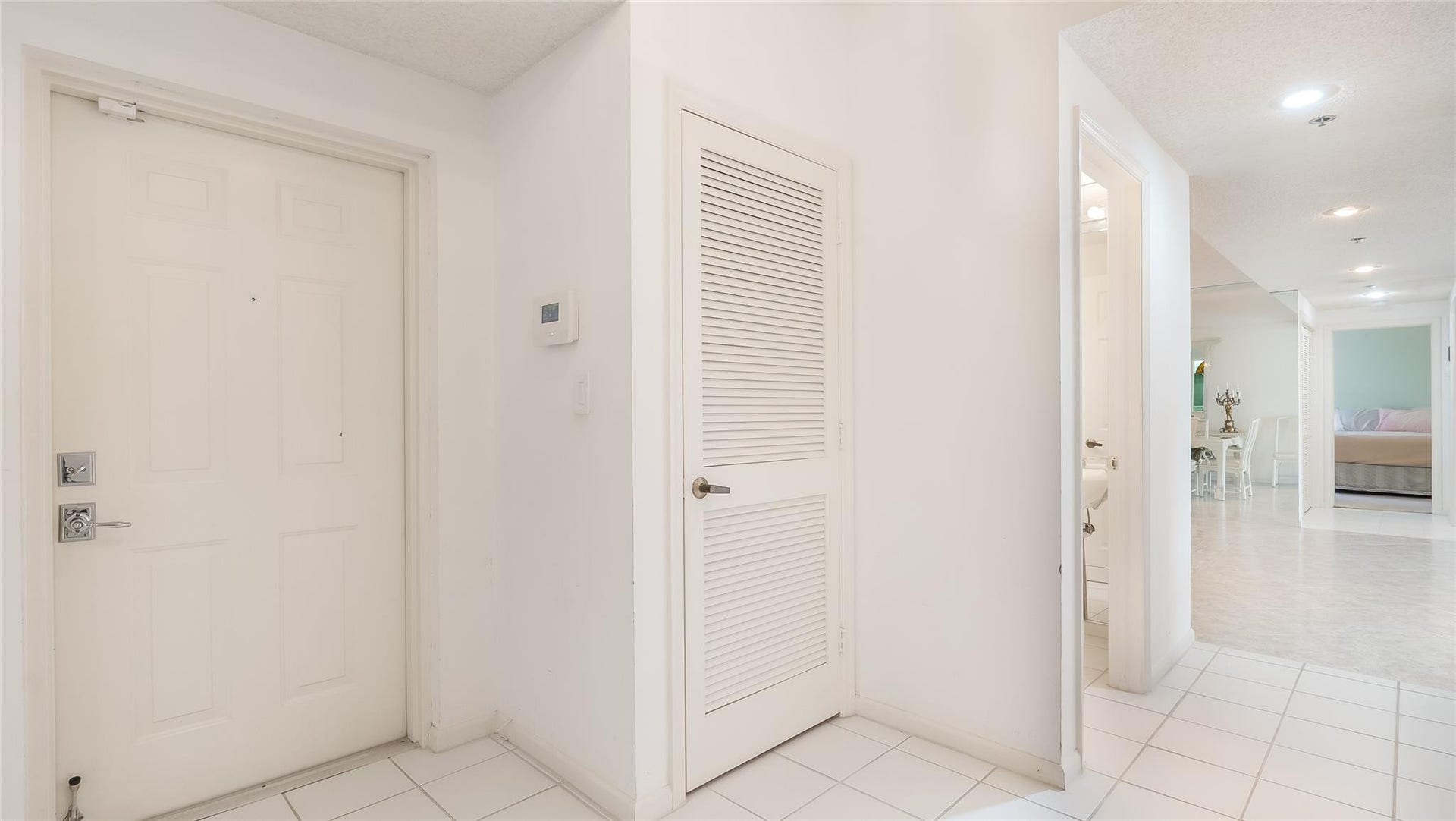 4116 W Palm Aire Drive, #165A, Pompano Beach, FL 33069 Formal welcomging foyer entry with coat closet.