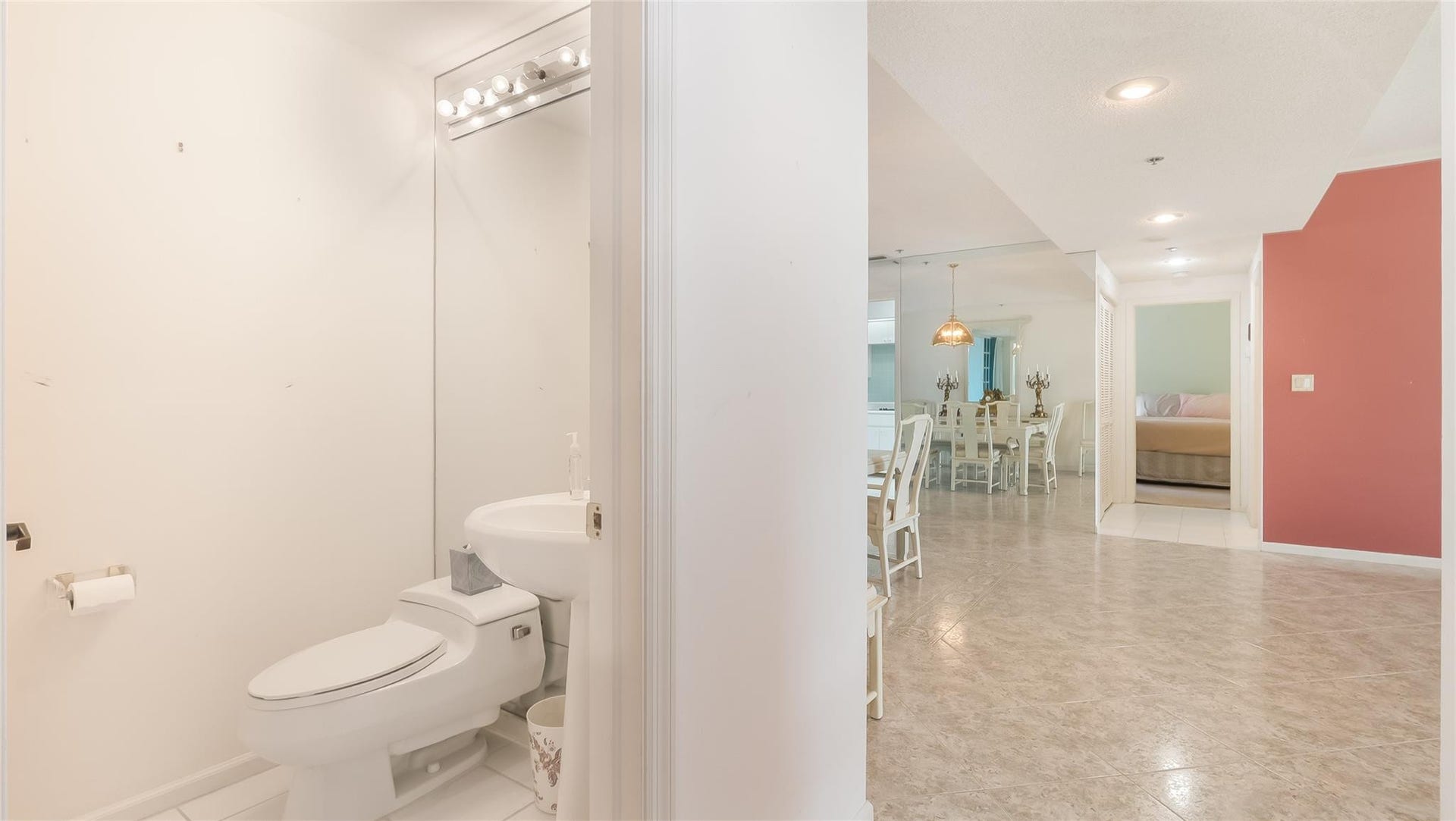 4116 W Palm Aire Drive, #165A, Pompano Beach, FL 33069 Half bathroom off foyer