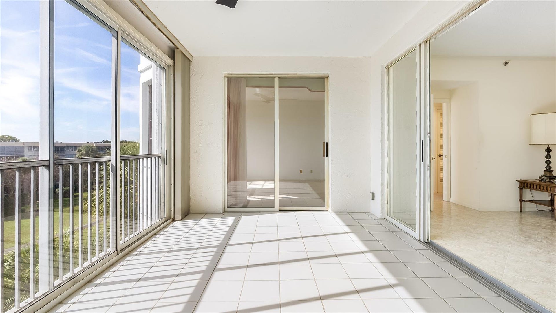 4116 W Palm Aire Drive, #165A, Pompano Beach, FL 33069 Large enclosed balcony off the living room and primary bedroom.