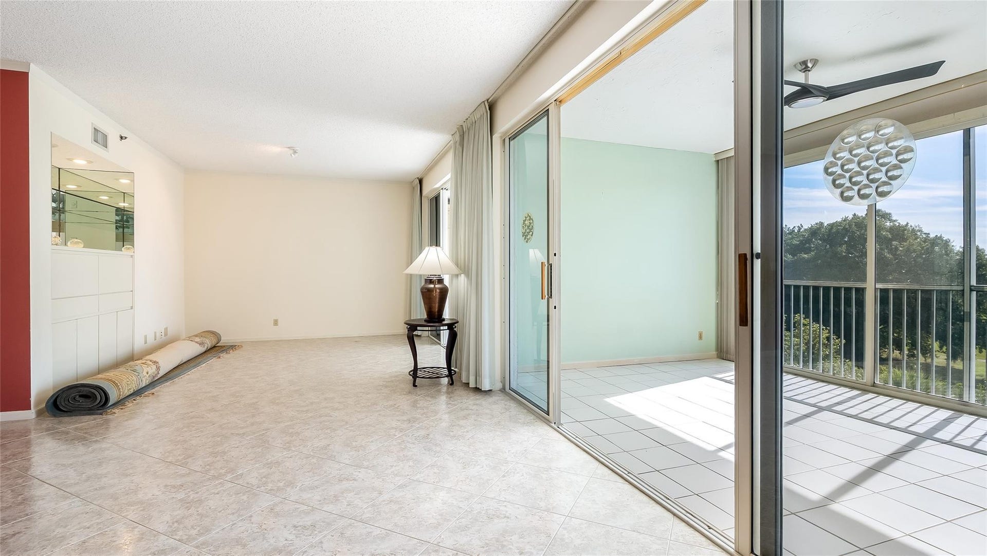 4116 W Palm Aire Drive, #165A, Pompano Beach, FL 33069 Bonus area off the vliving room with built in cabinets and bar area. Perfect confy tv area.