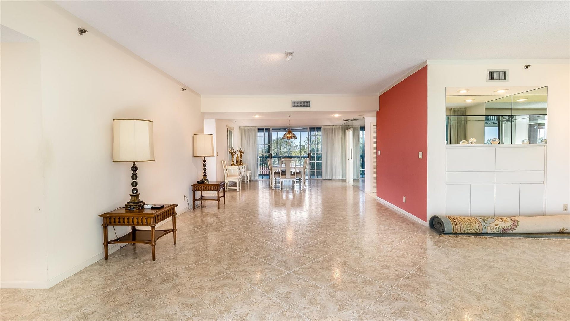 4116 W Palm Aire Drive, #165A, Pompano Beach, FL 33069 Living room facing the dining room.