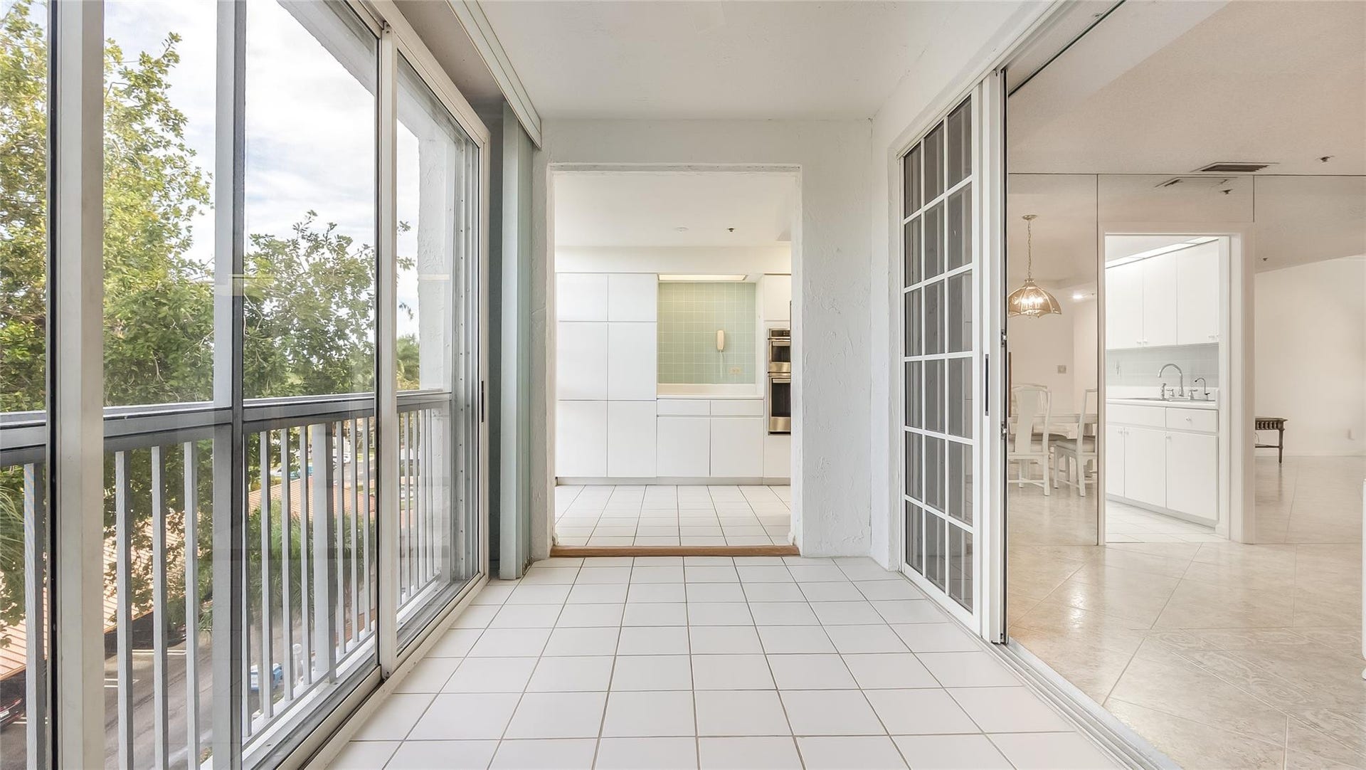 4116 W Palm Aire Drive, #165A, Pompano Beach, FL 33069 Enclosed balcony off of the kitchen and dining room.