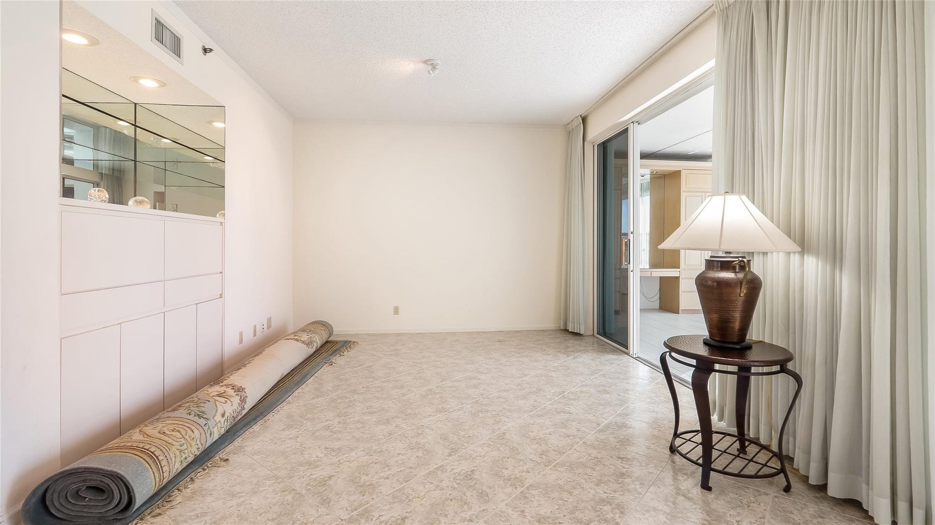 4116 W Palm Aire Drive, #165A, Pompano Beach, FL 33069 Bonus area off the vliving room with built in cabinets and bar area. Perfect confy tv area.