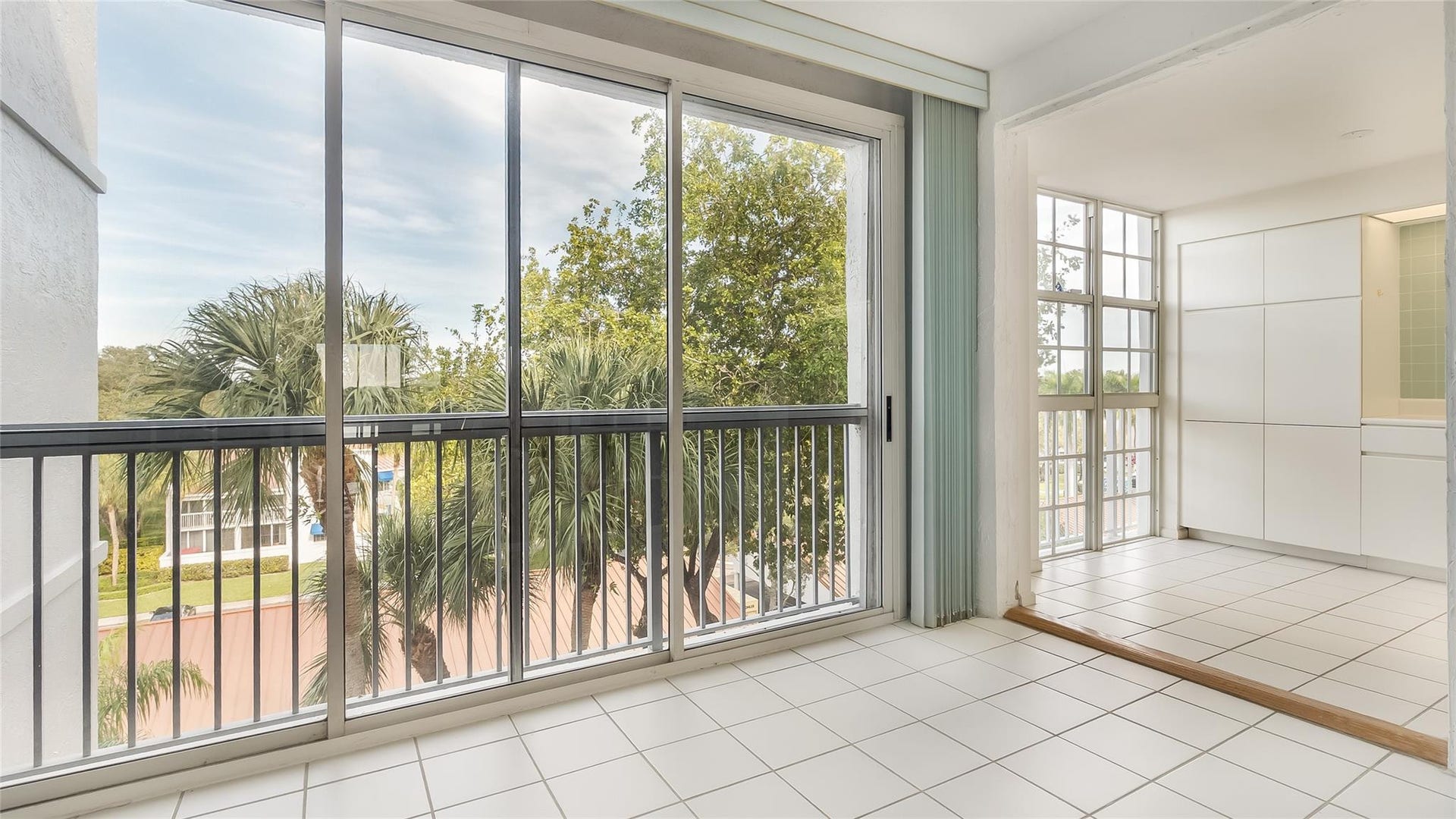 4116 W Palm Aire Drive, #165A, Pompano Beach, FL 33069 Enclosed balcony off of the kitchen and dining room.