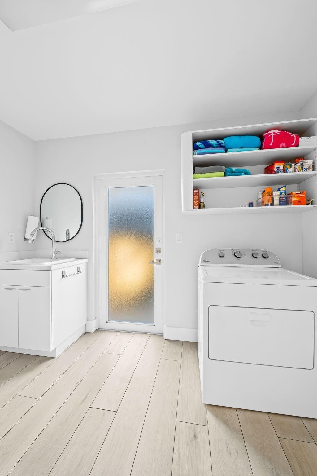 1731 NE 23rd Avenue, Fort Lauderdale, FL 33305 Laundry with 1/2 bath