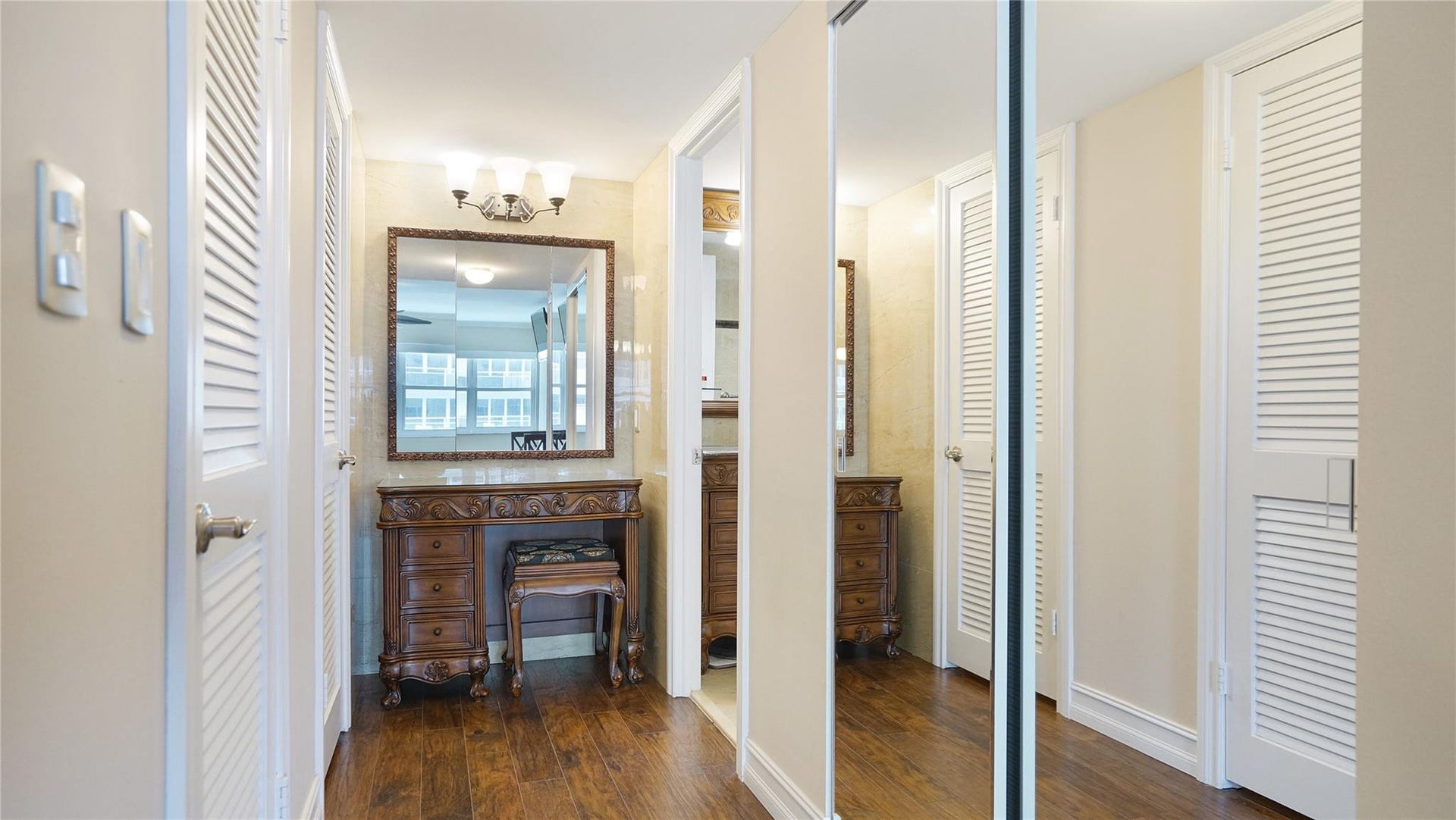 3410 Galt Ocean Drive, #802 N, Fort Lauderdale, FL 33308 The two walk in closets are on the left. The glass doors on the right is another closet. Beyond that is the primary bath.