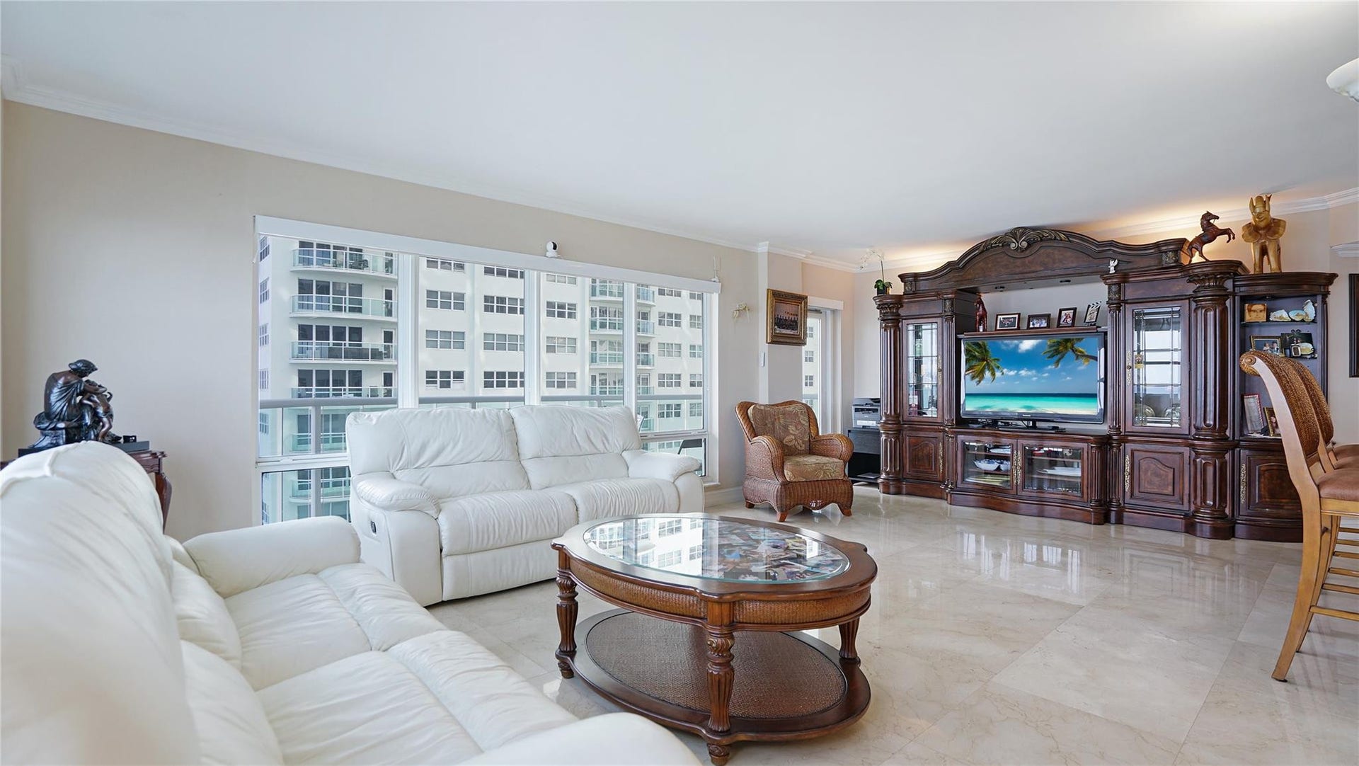 3410 Galt Ocean Drive, #802 N, Fort Lauderdale, FL 33308 The door to the right of the chair leads out to the balcony.