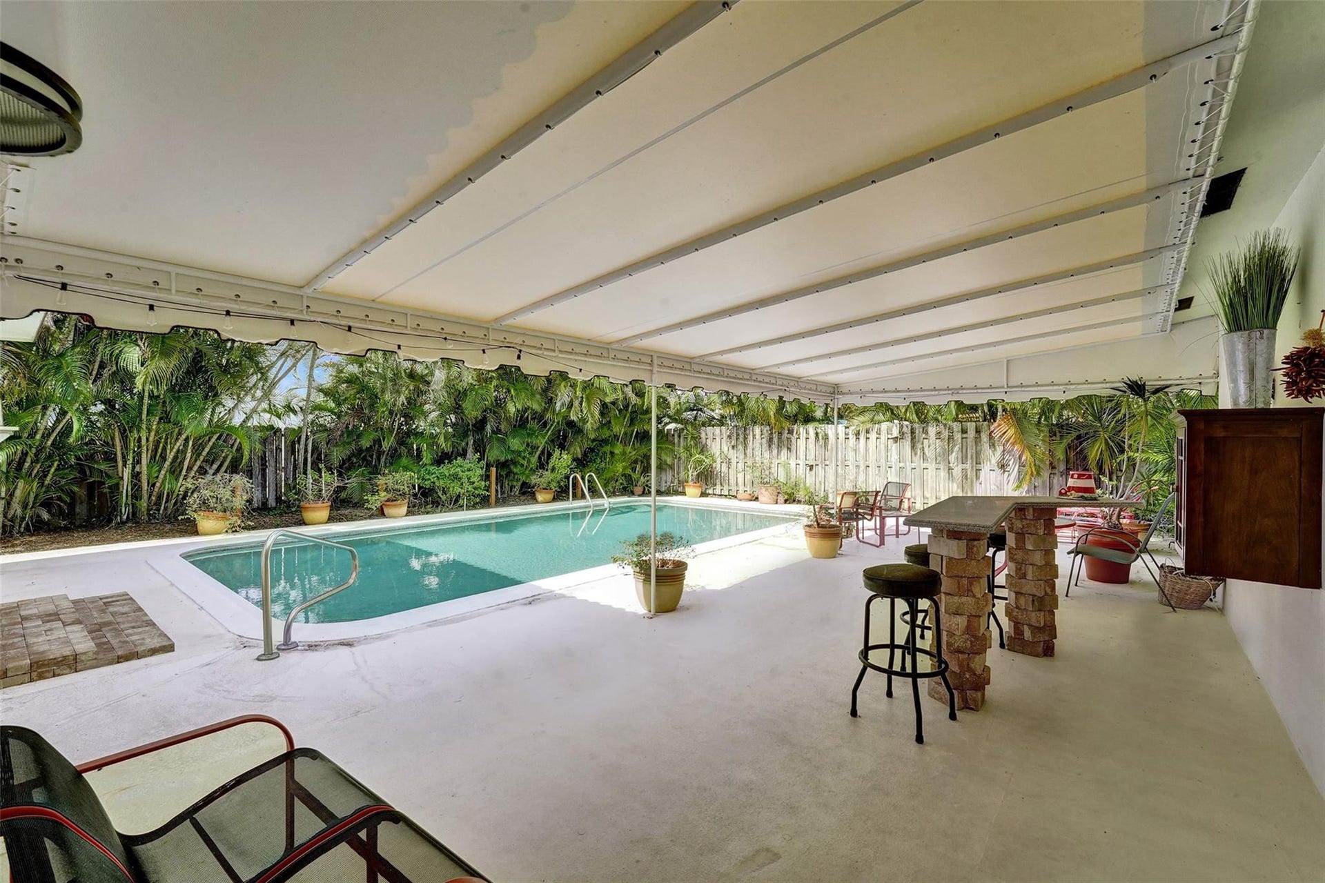 4731 NE 13 Avenue, Oakland Park, FL 33334 Huge covered patio perfect for entertaining.
