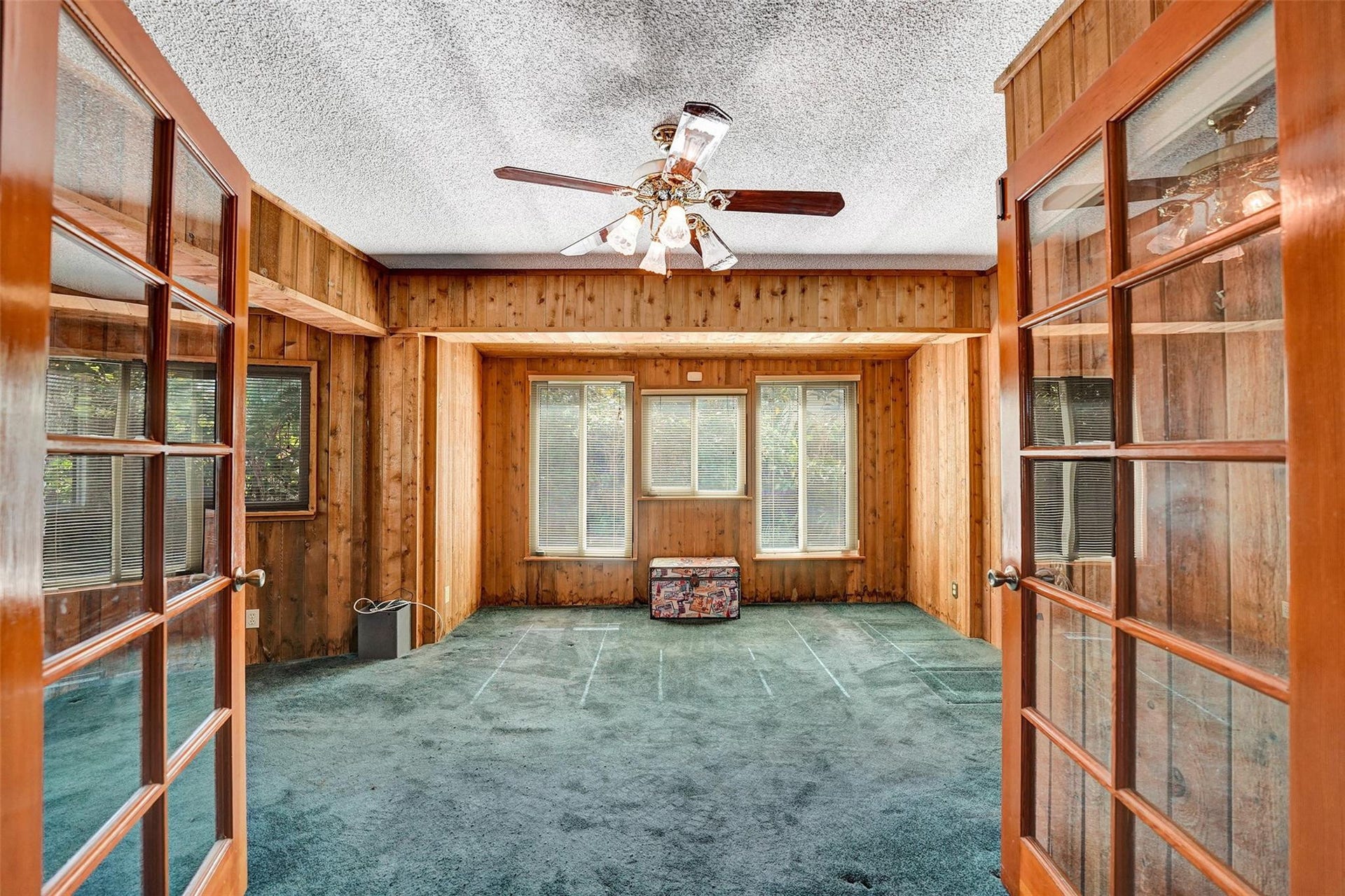 4731 NE 13 Avenue, Oakland Park, FL 33334 Second bedroom with double French door entry and bay window.