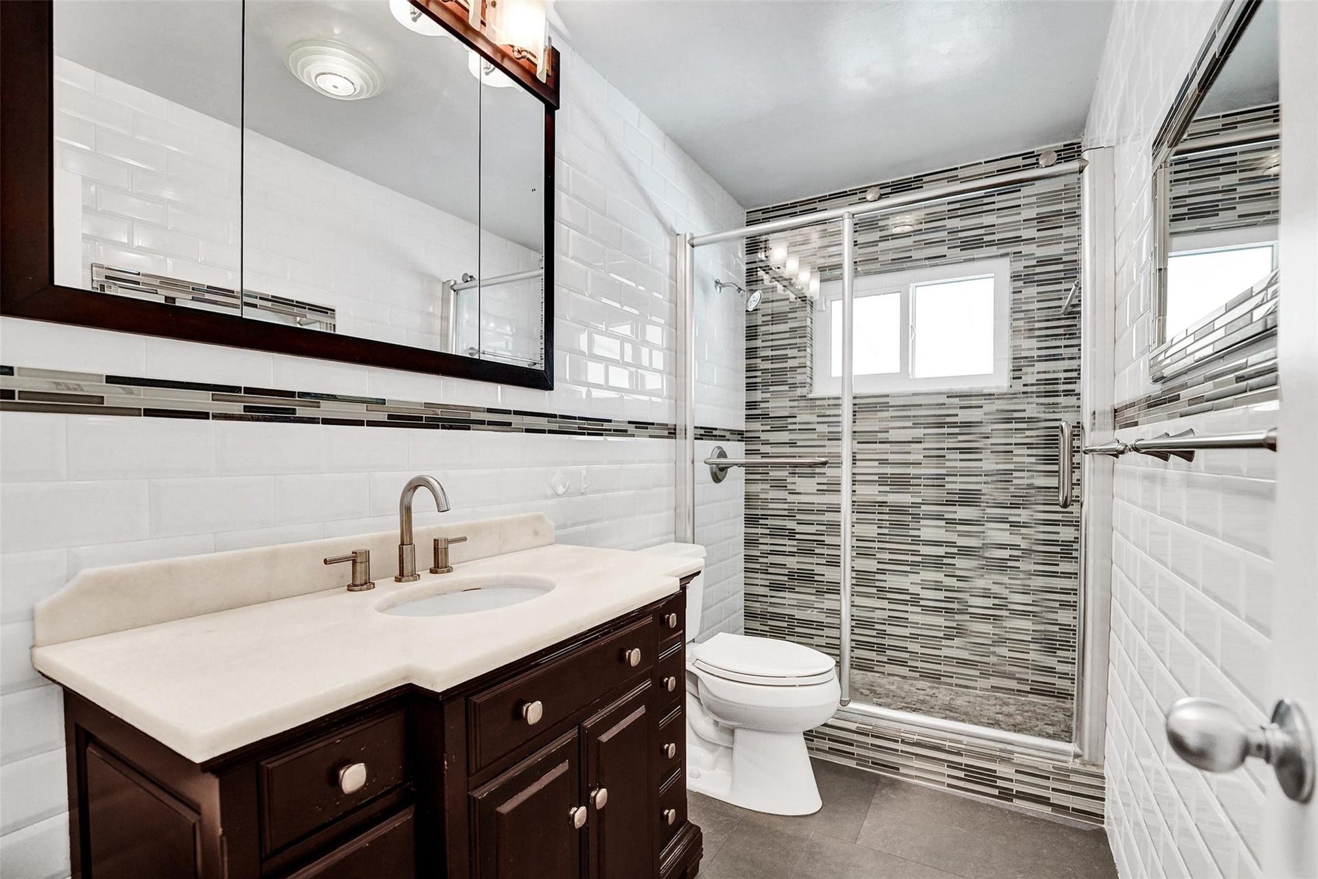 4731 NE 13 Avenue, Oakland Park, FL 33334 Third beautifully updated bathroom.