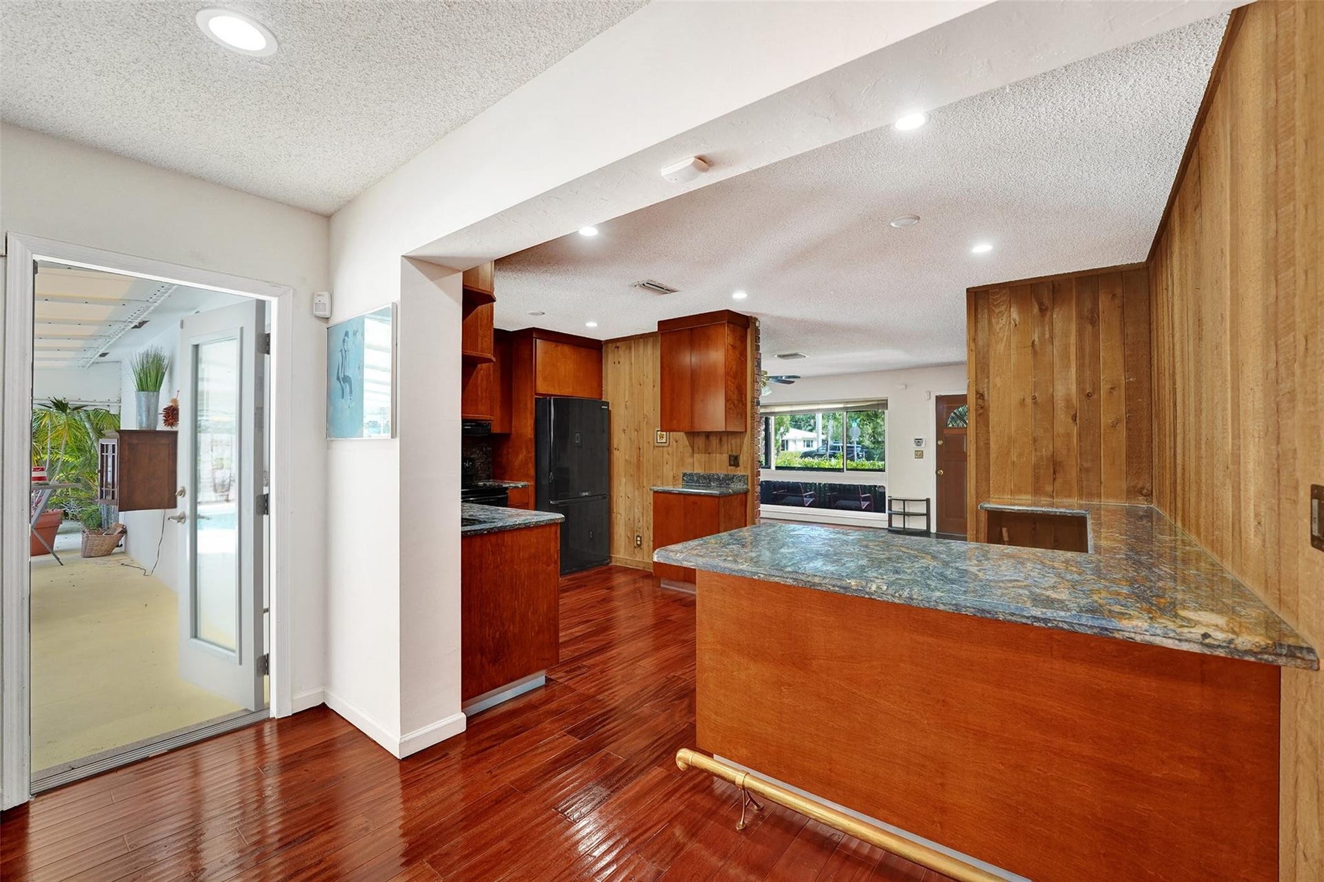4731 NE 13 Avenue, Oakland Park, FL 33334 View of kitchen from dining area.