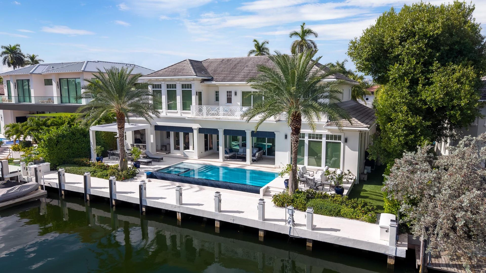 Enjoy waterfront views from your heated, saltwater pool.