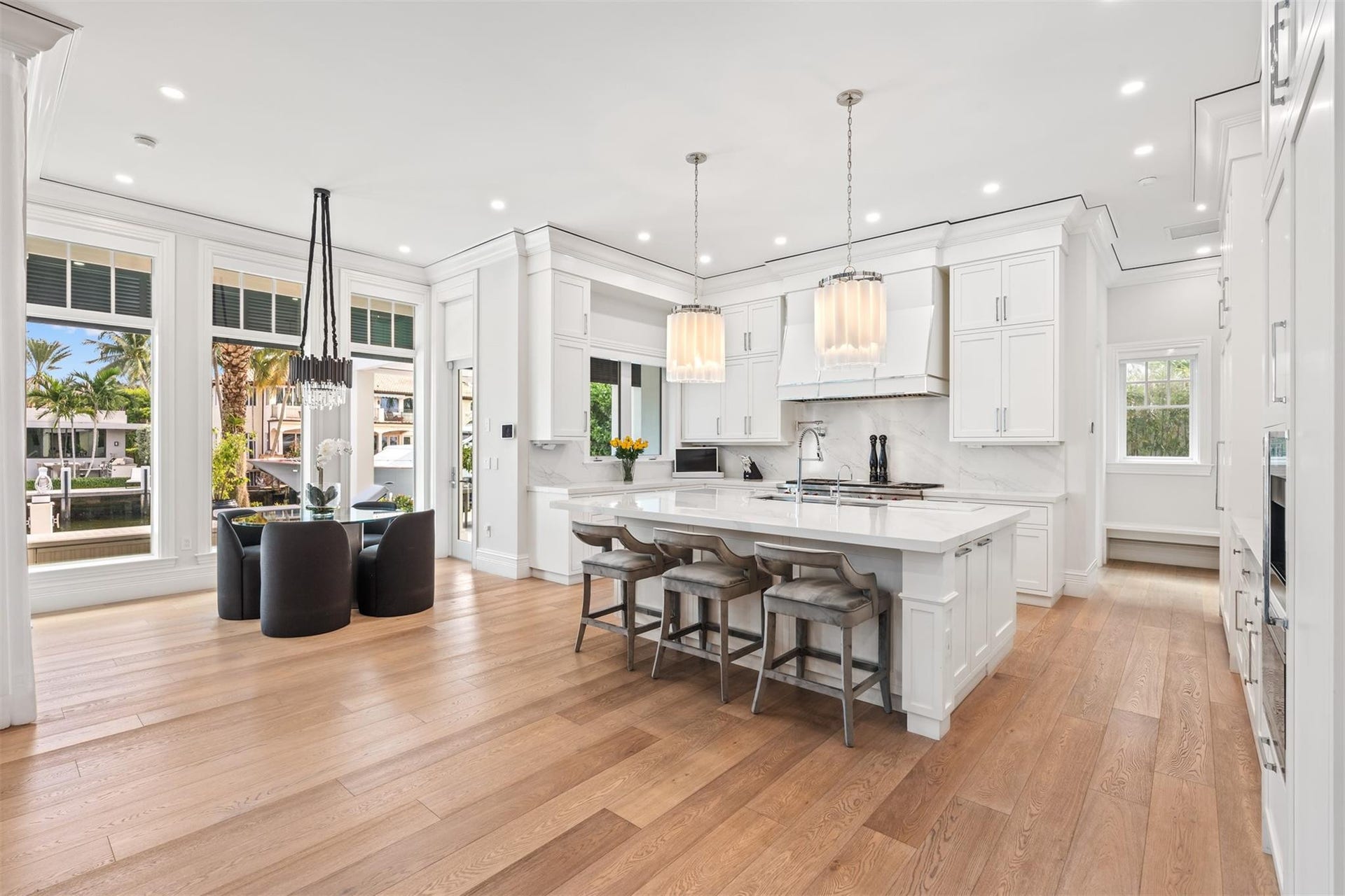 A chef's dream! Equipped with Sub-Zero and Wolf appliances. Overlook your main living space while eating and cooking.