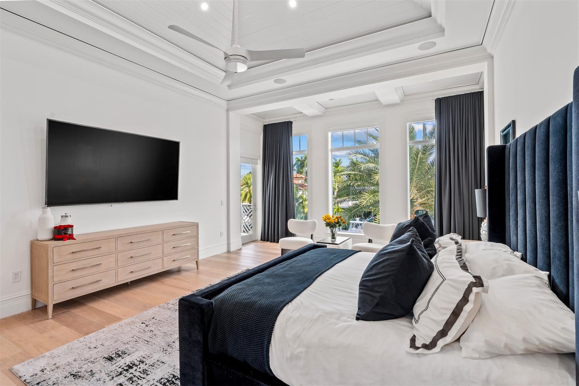 Primary suite with waterfront views and separate his and her bathrooms and closets.