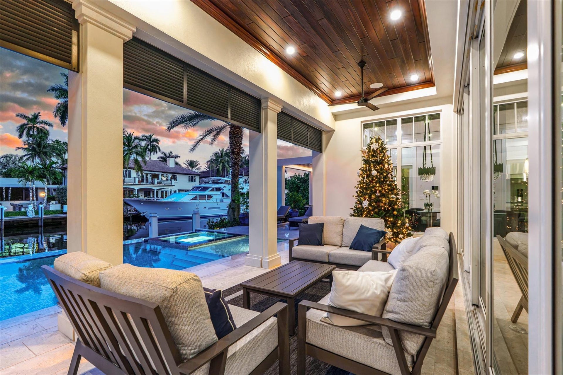 Enjoy sunsets from your covered, outdoor space. Perfect for days by the pool or relaxing and enjoying the waterfront views in the shade after a day of boating.