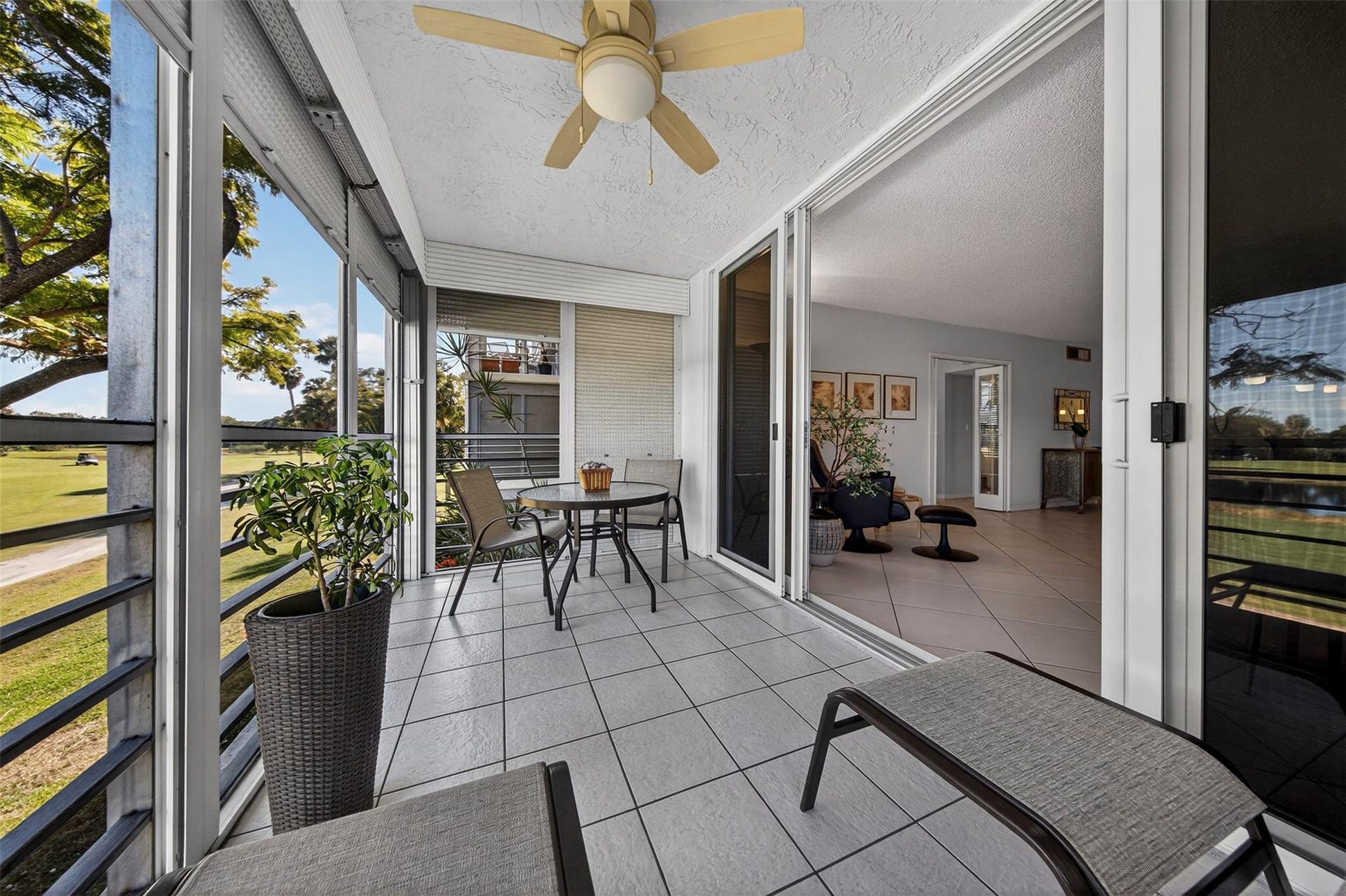 808 Cypress Boulevard, #203, Pompano Beach, FL 33069 screened-in balcony to enjoy the view and the breeze