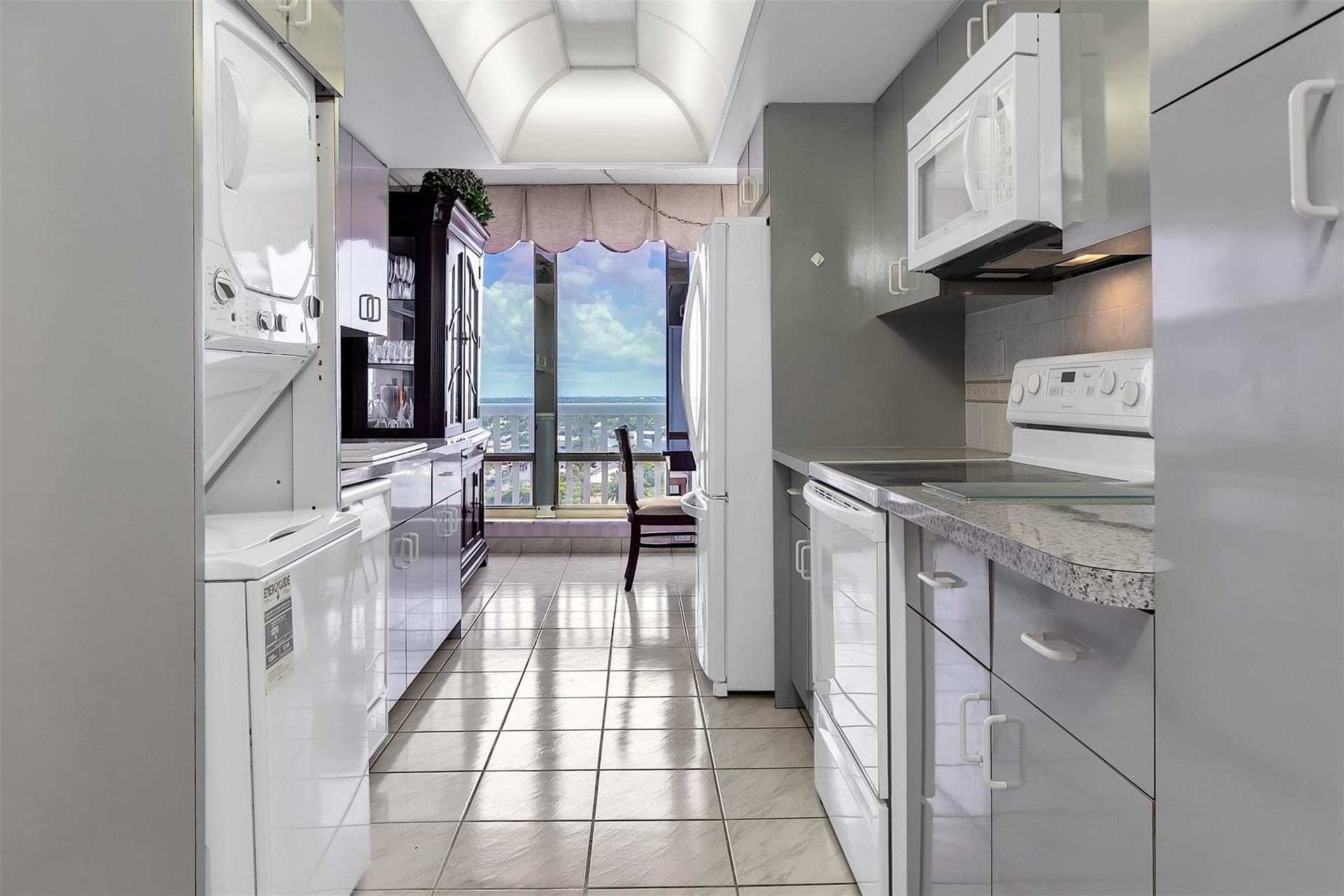 Galley Kitchen, W/D and entrance into dining Room