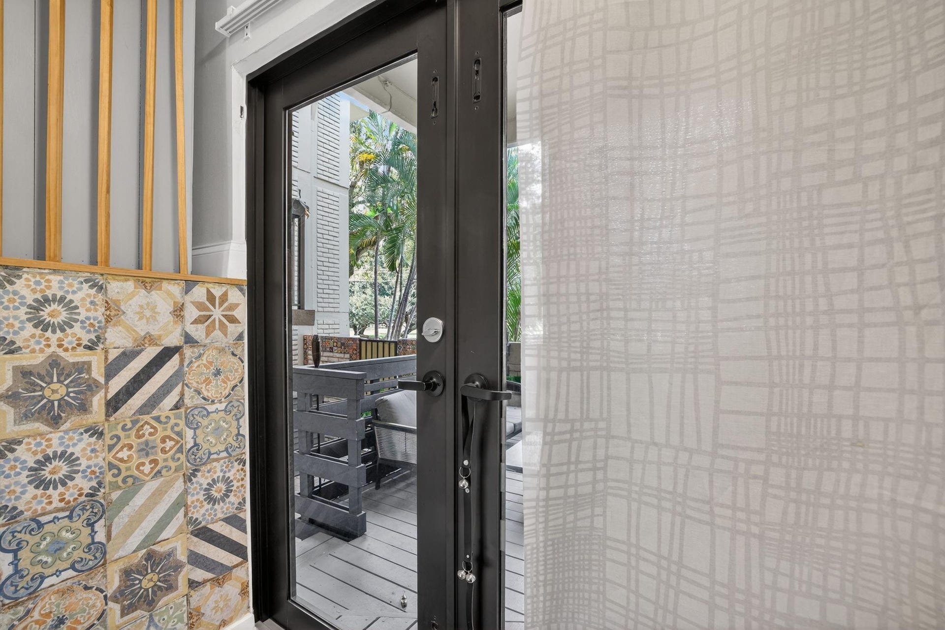 1401 NE 9th Street, #13, Fort Lauderdale, FL 33304 Mid-Landing Door with access to Deck and Back Patio.